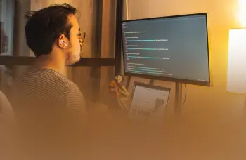 Developer Coding at Computer
