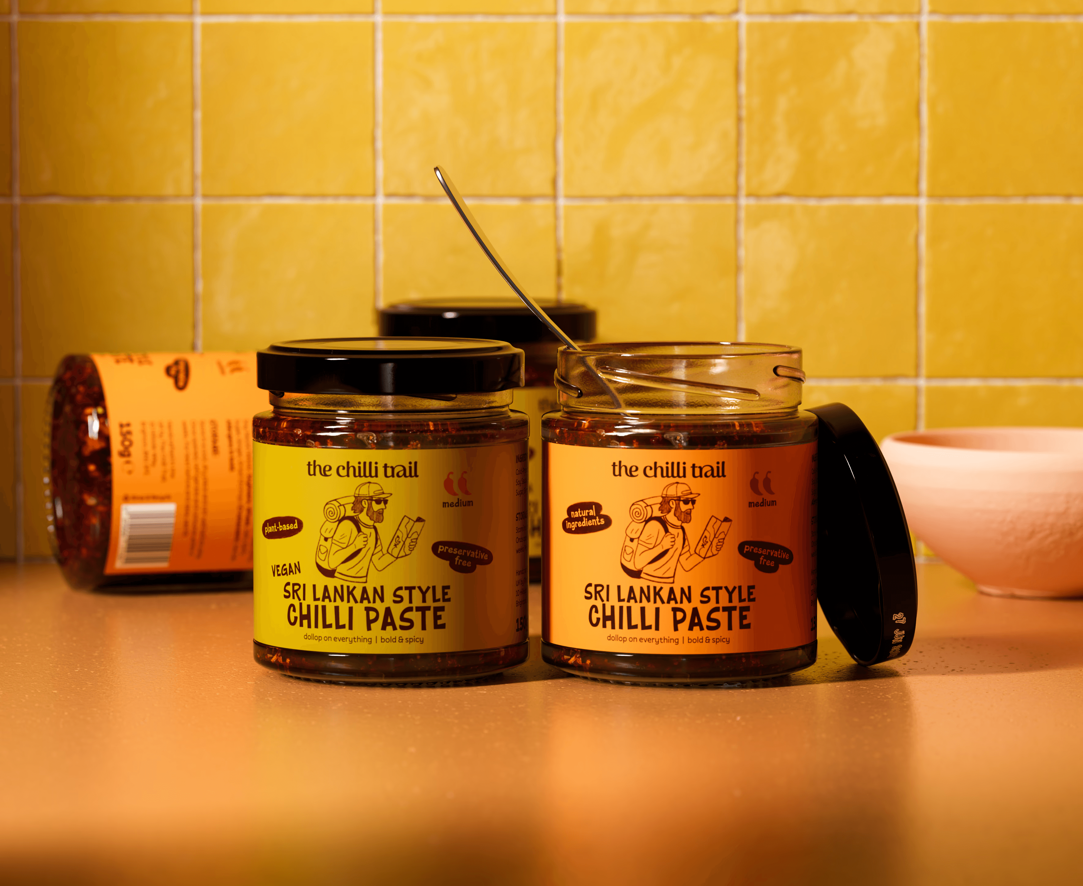 Close-up of vibrant purple flowers with droplets of water, creating a rich, textured background.