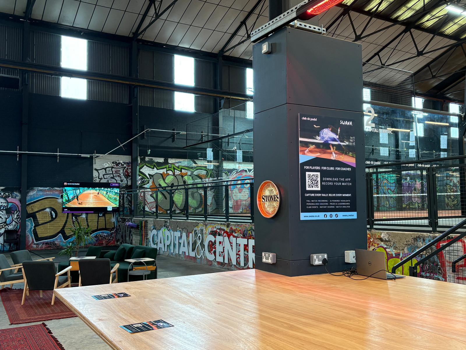 Drone shot of a running track at night