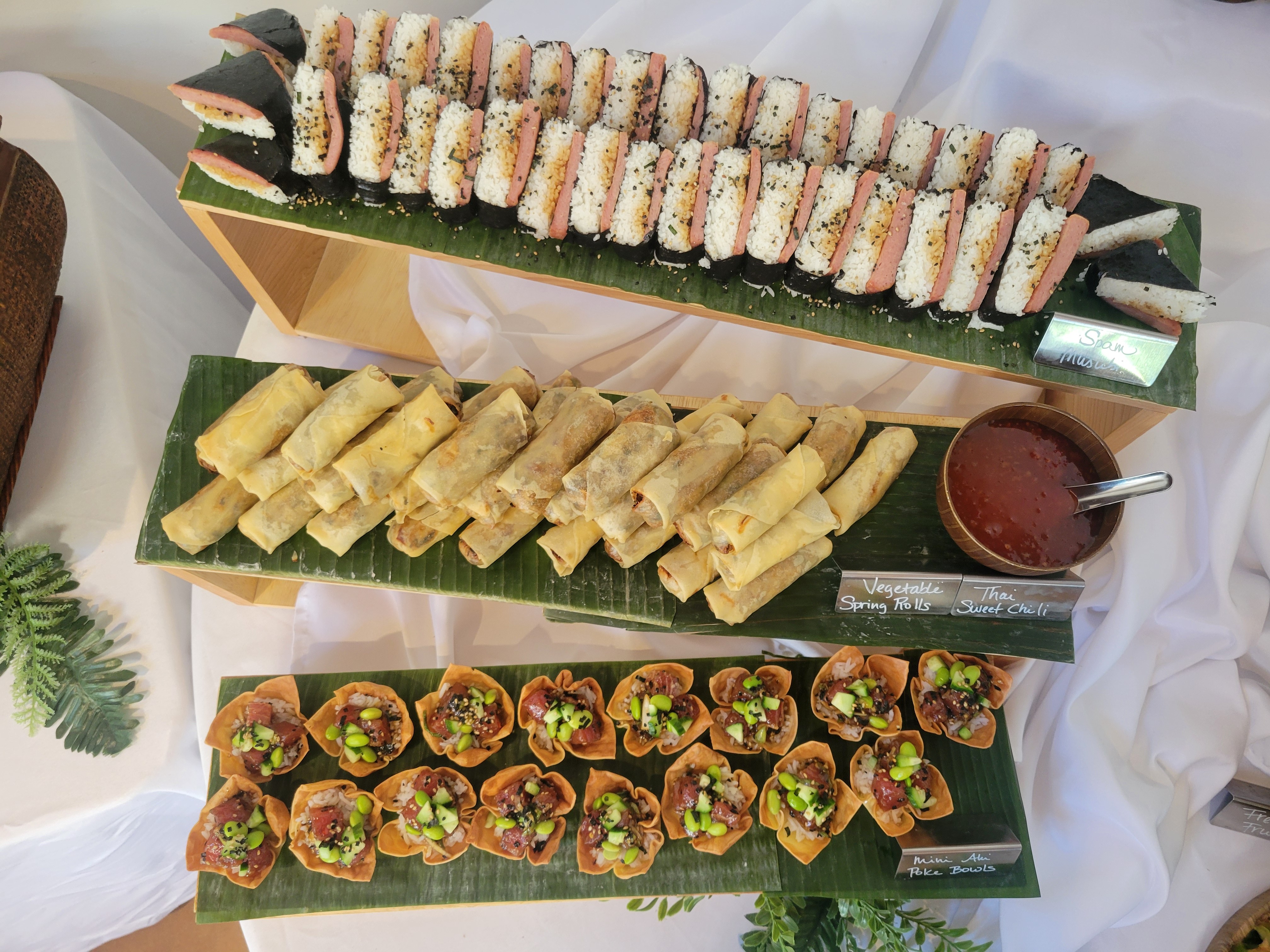 Close-up of the crispy texture and fresh vegetable filling of our signature spring rolls.