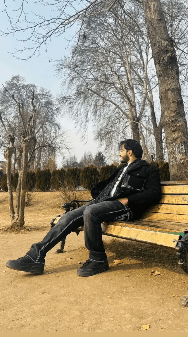 man in suit with laptop