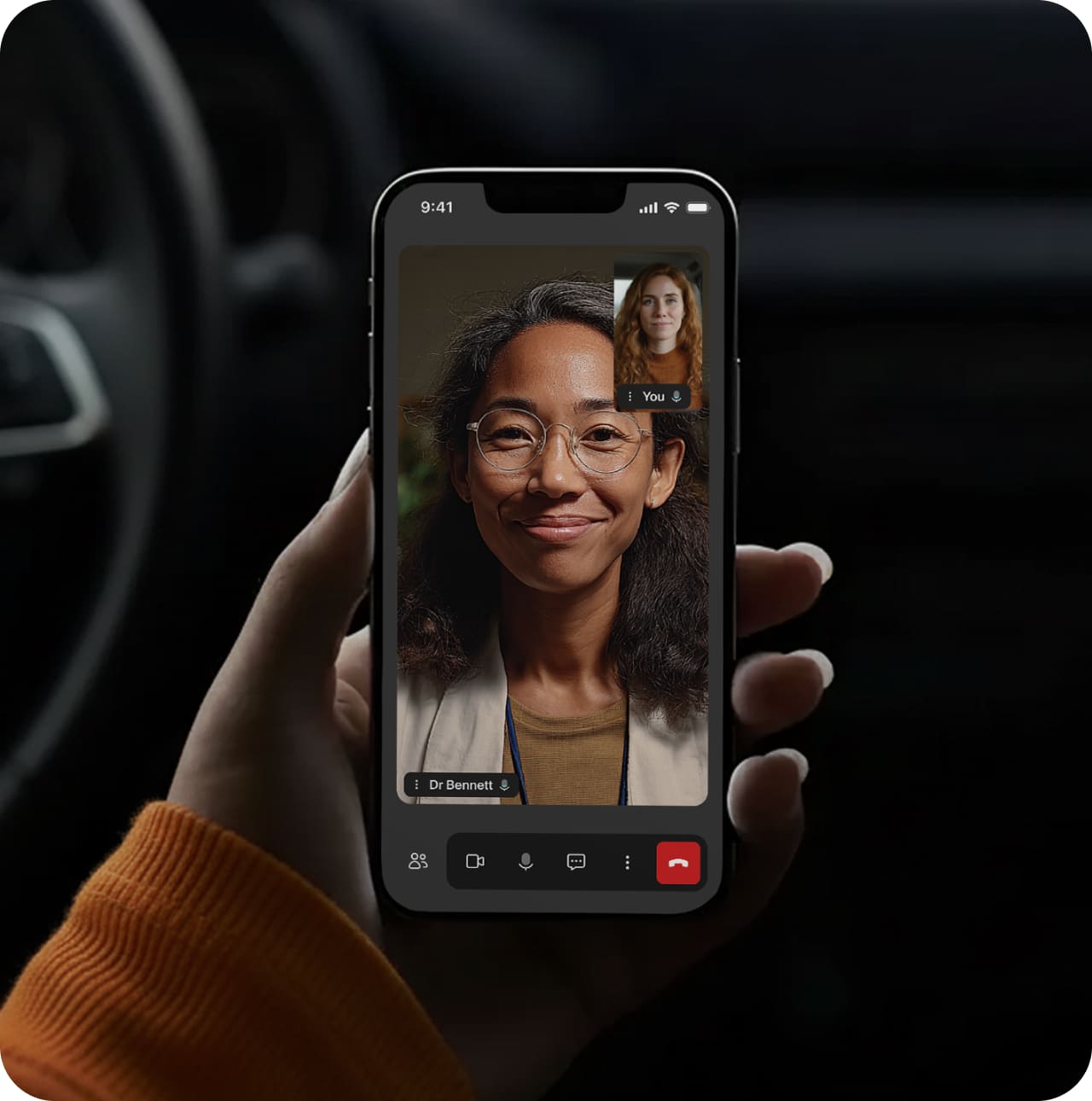 the doxy.me call UI on a smartphone during a call in a car.