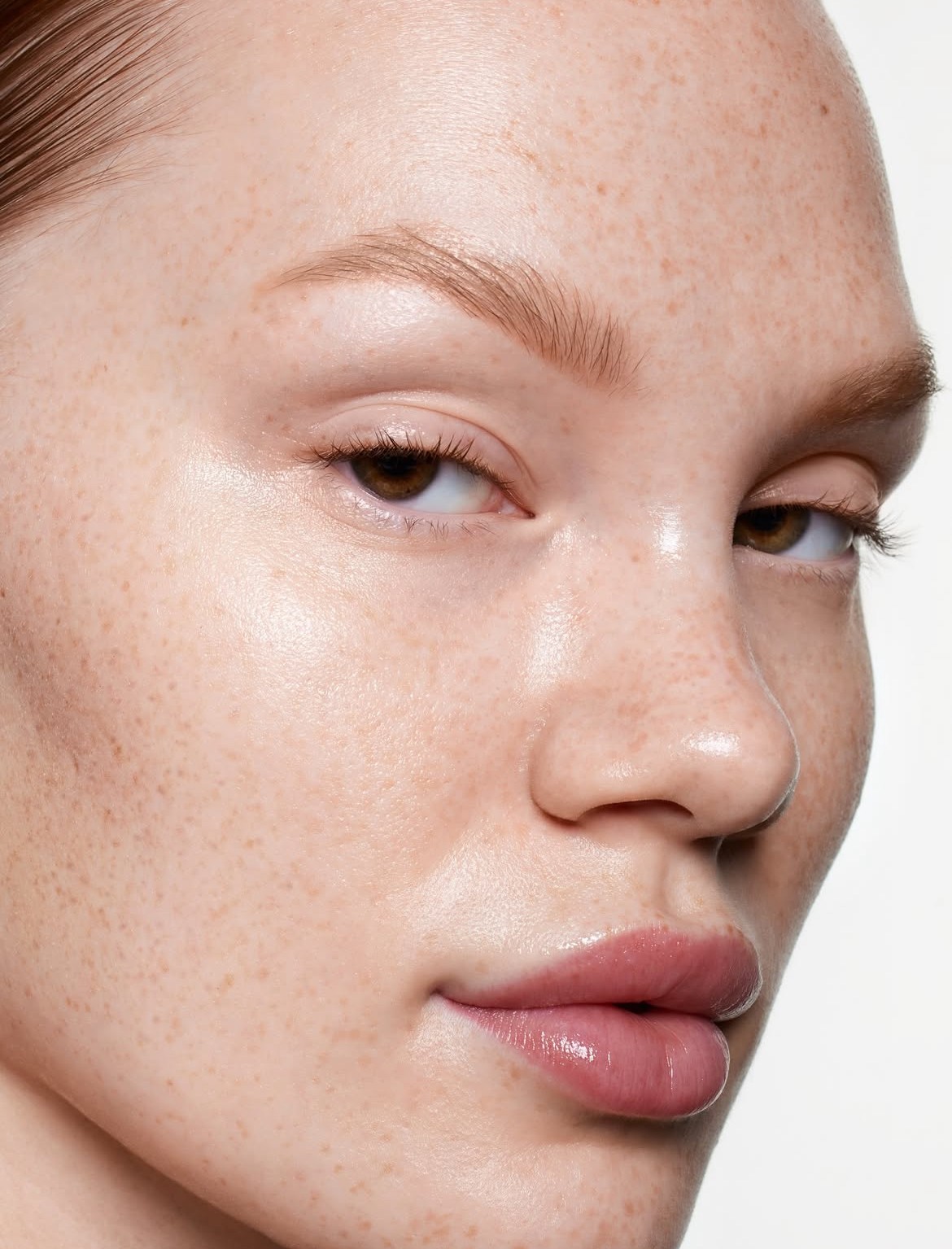 Laptop displaying website on wooden table
