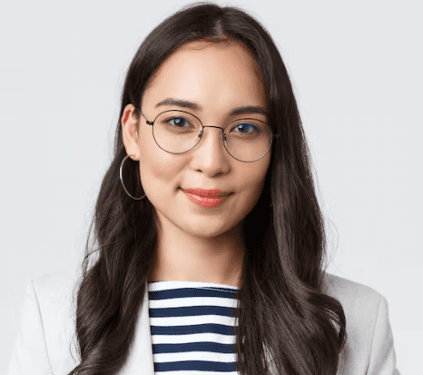 a man with a goatee smiles at the camera
