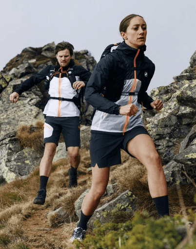 woman and man doing a trail run in mammut outdoor apparel