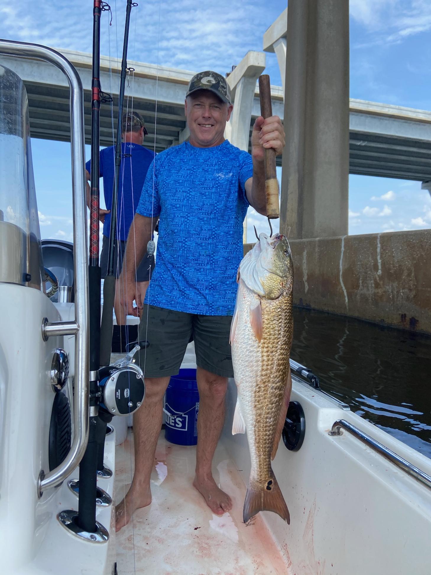 Man holding Redfish