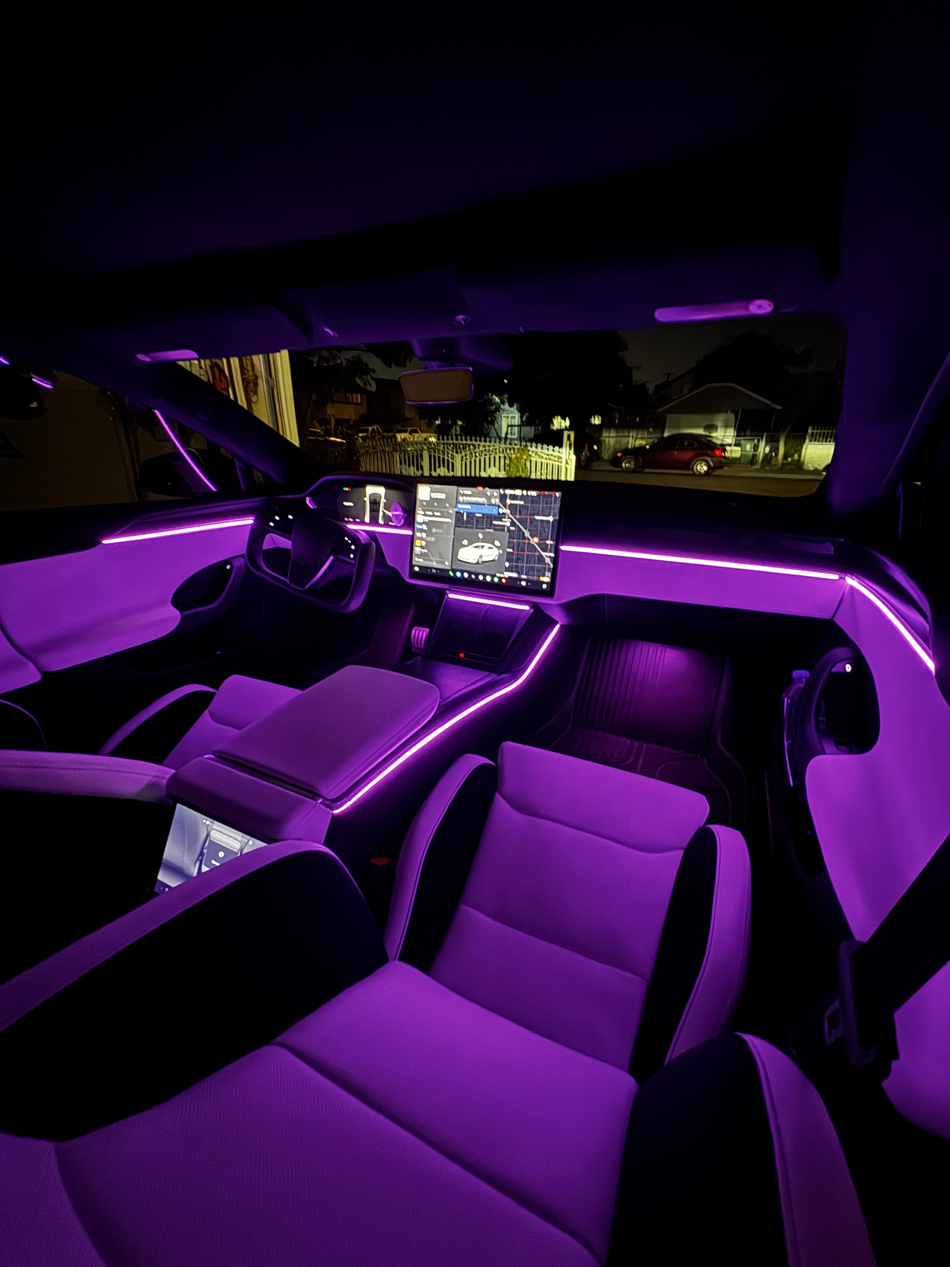 Tesla Model 3 dashboard with ambient lighting strips installed