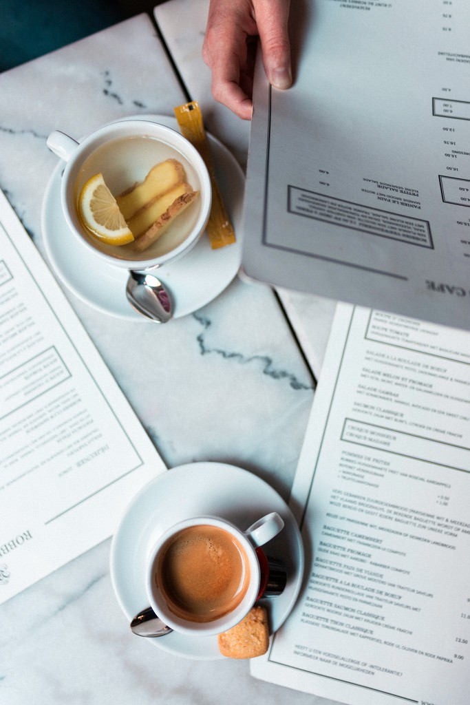 brown liquid in white ceramic mug