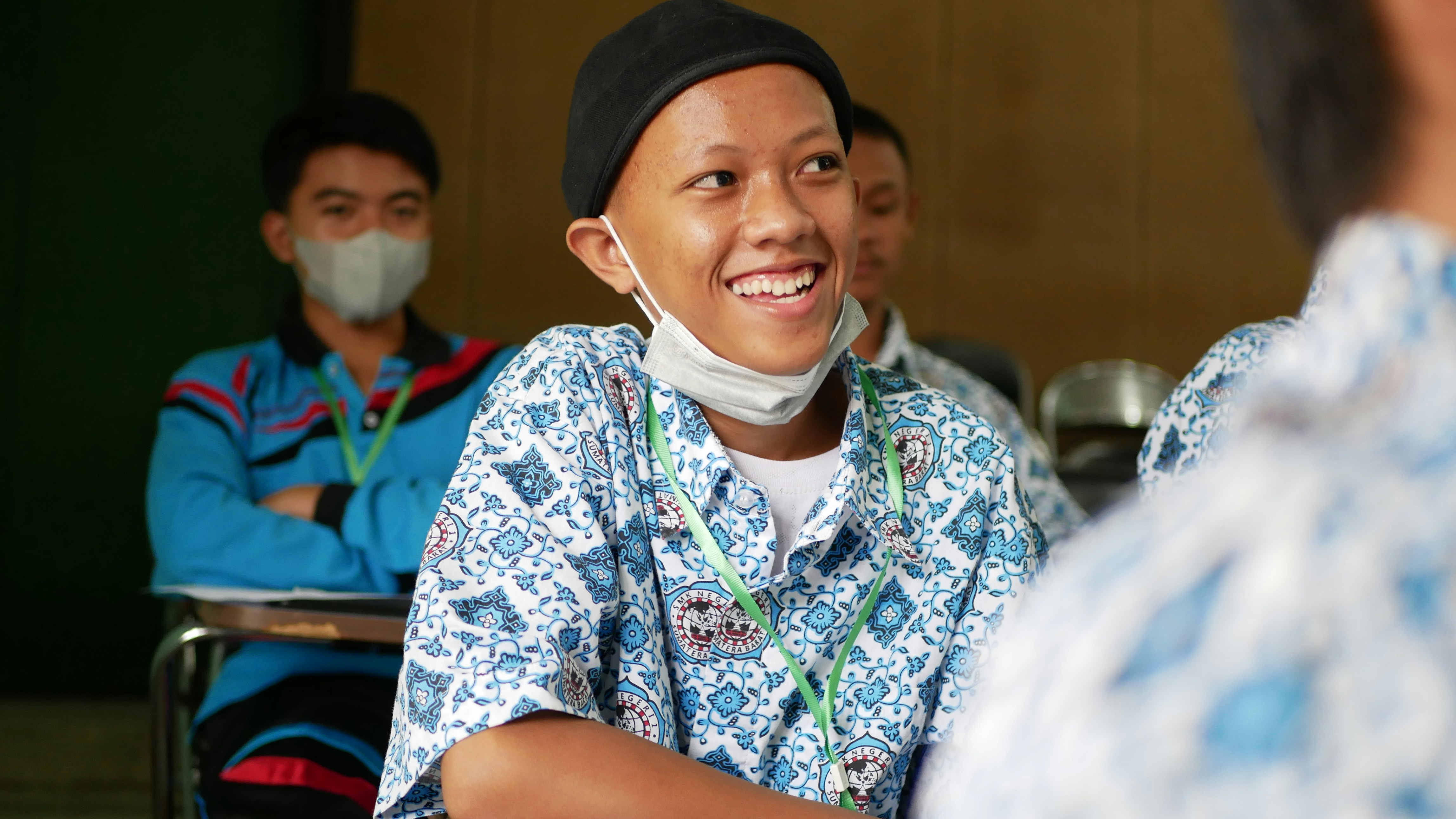 a woman wearing a bandana and a face mask