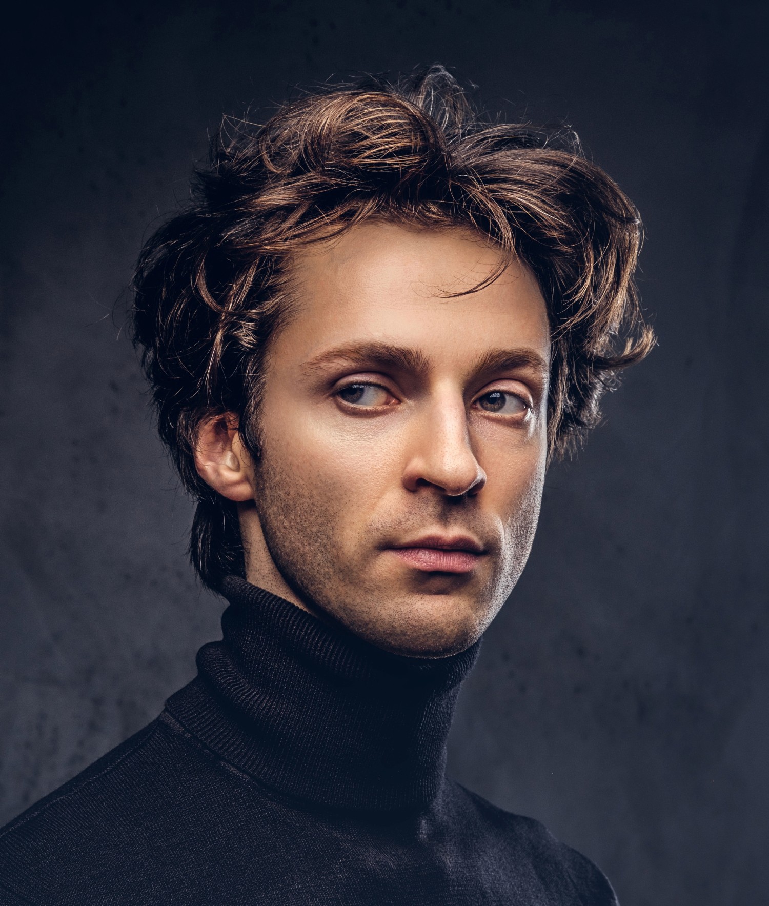 portrait photo of an attractive male in turtleneck