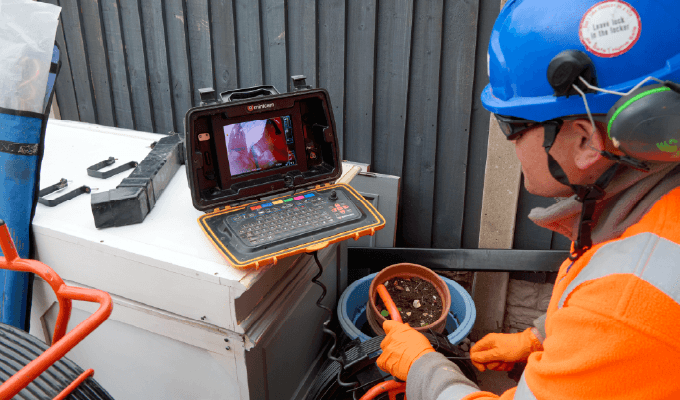 Mainmark technician using CCTV to complete a subsidence survey
