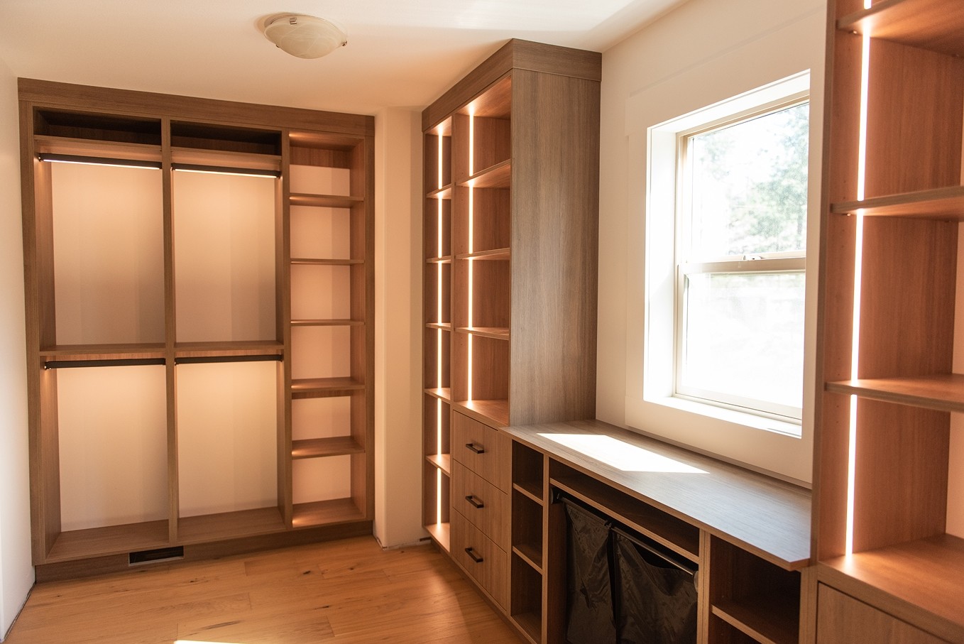 Custom wood bar cabinetry with built-in shelves