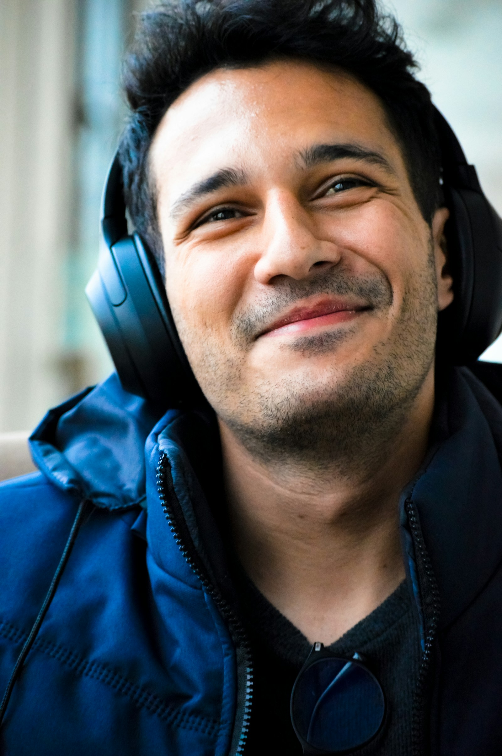 Smiling man wearing headphones