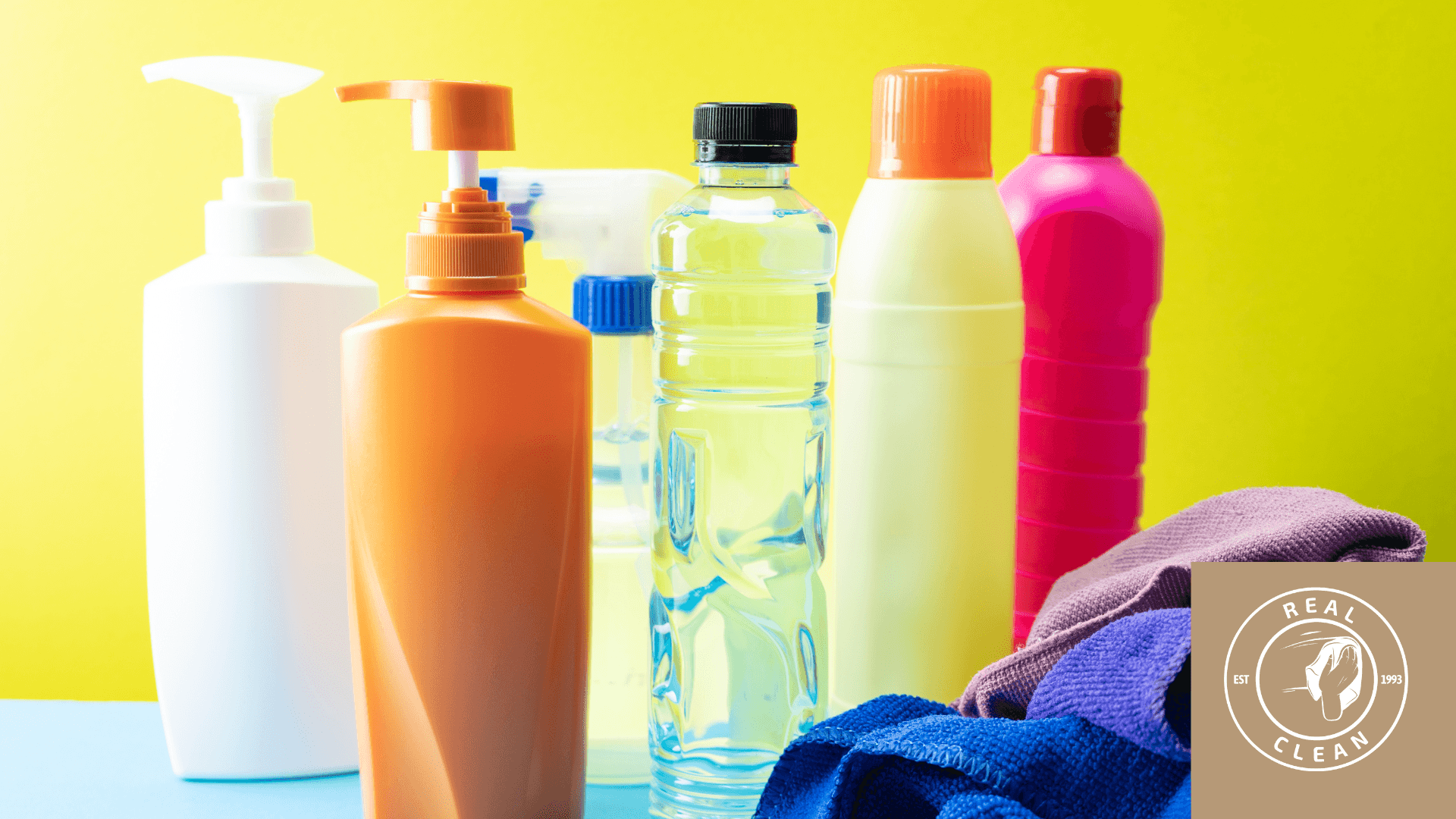 Differnet bottles and cleaning products against a yellow background