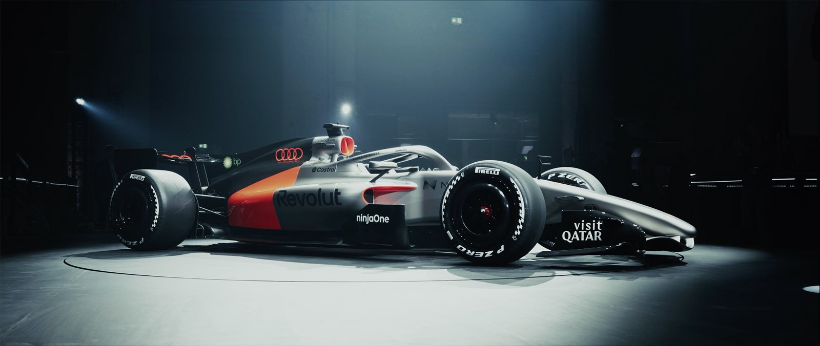 Drone shot of a running track at night