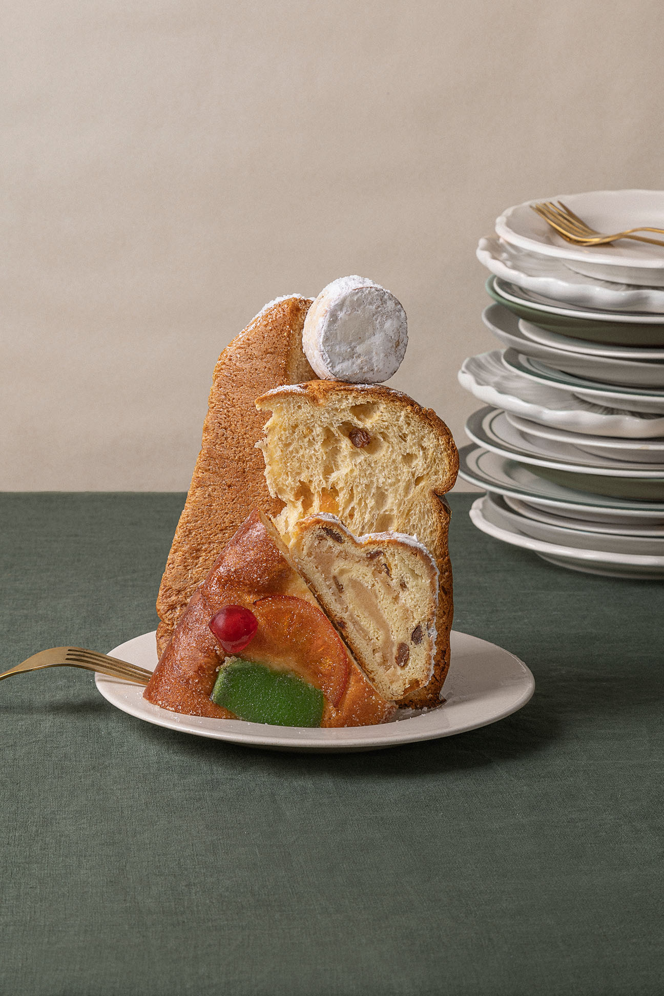 a group of penguins standing on top of a sandy ground