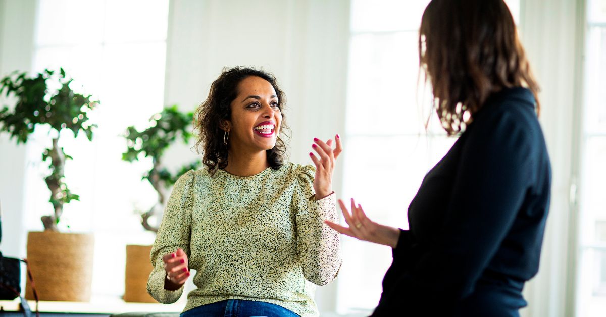 Sanhna and Annie discussing things