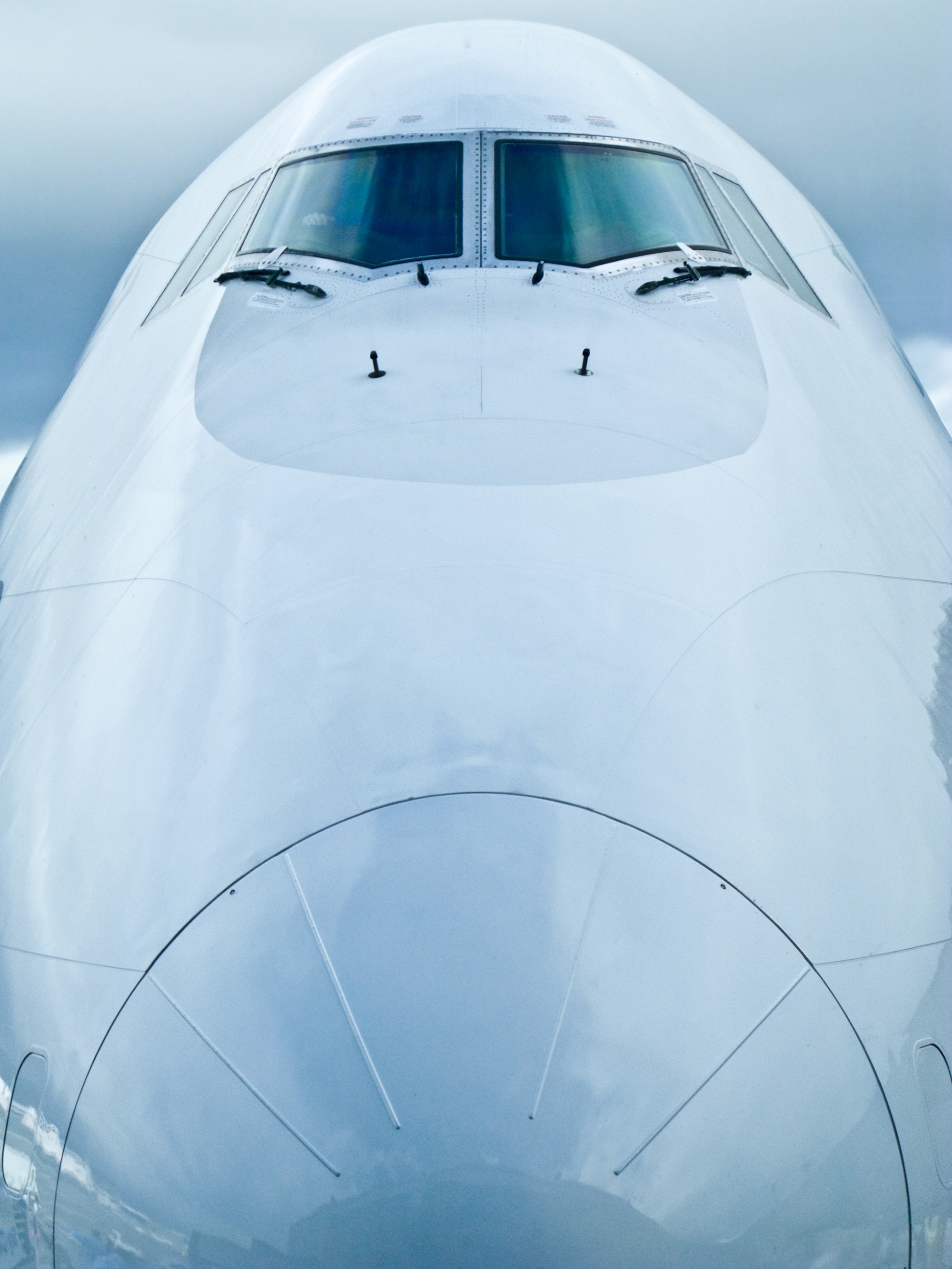 Closeup of airplane nose and front windshield