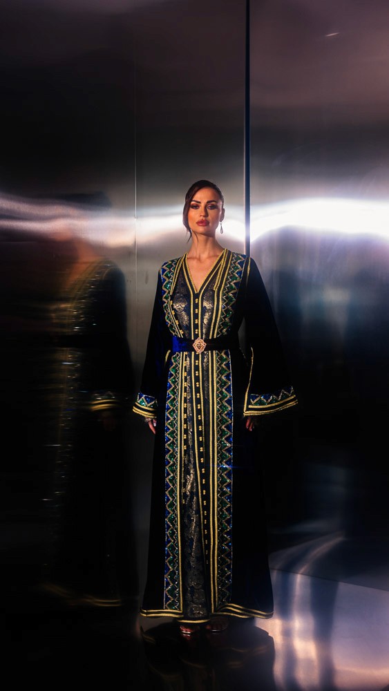 Deepsea Blue Moroccan caftan with gold and green embroidery, handcrafted couture design inspired by traditional Moroccan artistry