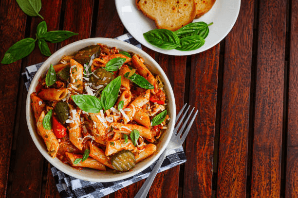 Italian family enjoying traditional pasta meal together at home