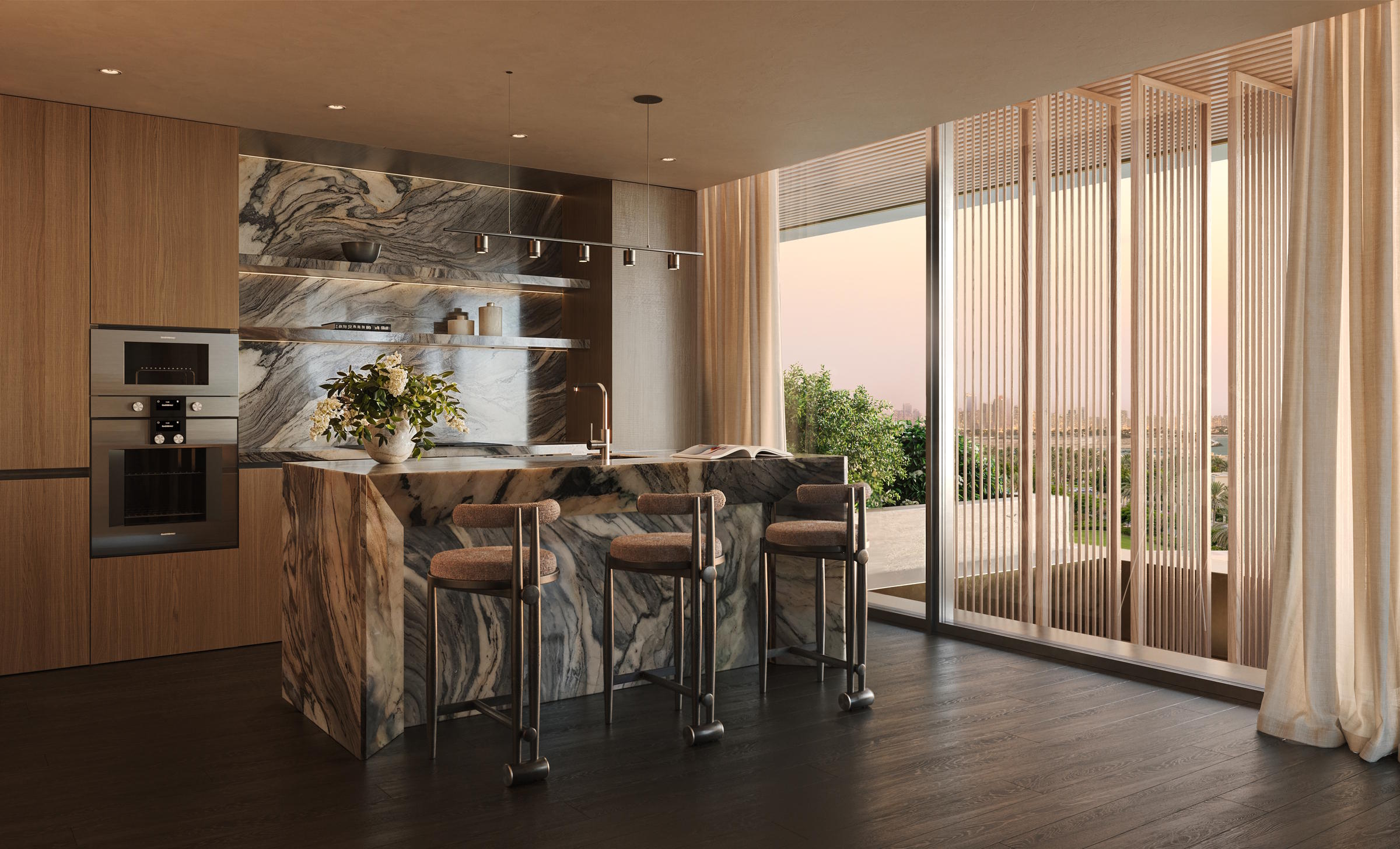 Sleek minimalist kitchen cabinetry and built-in display shelves in a luxury property for sale.