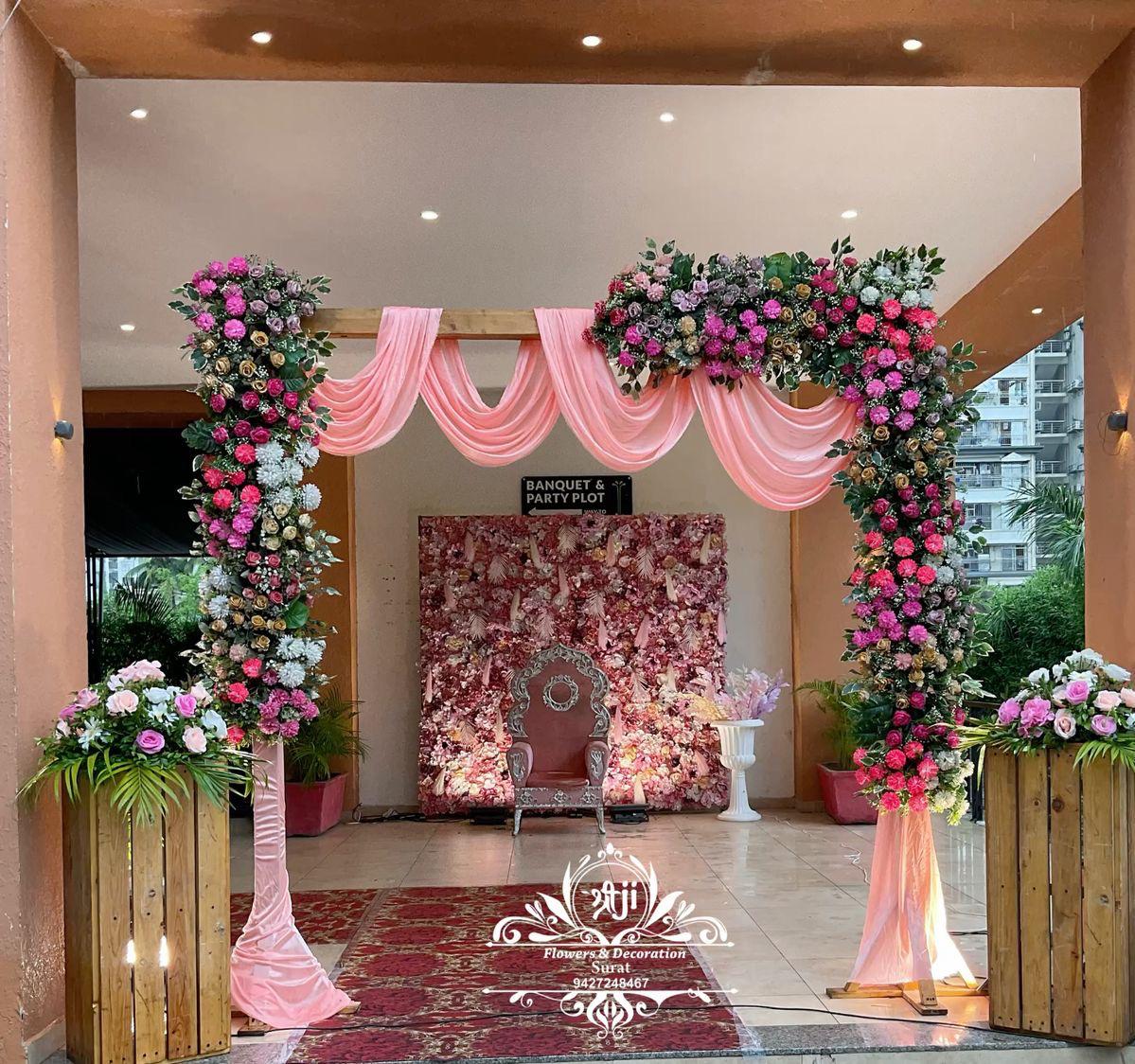 Engagement or Roka entrance gate decoration with pink drapes & colorful flowers in Janakpuri, Pitampura, Raj Nagar Extension