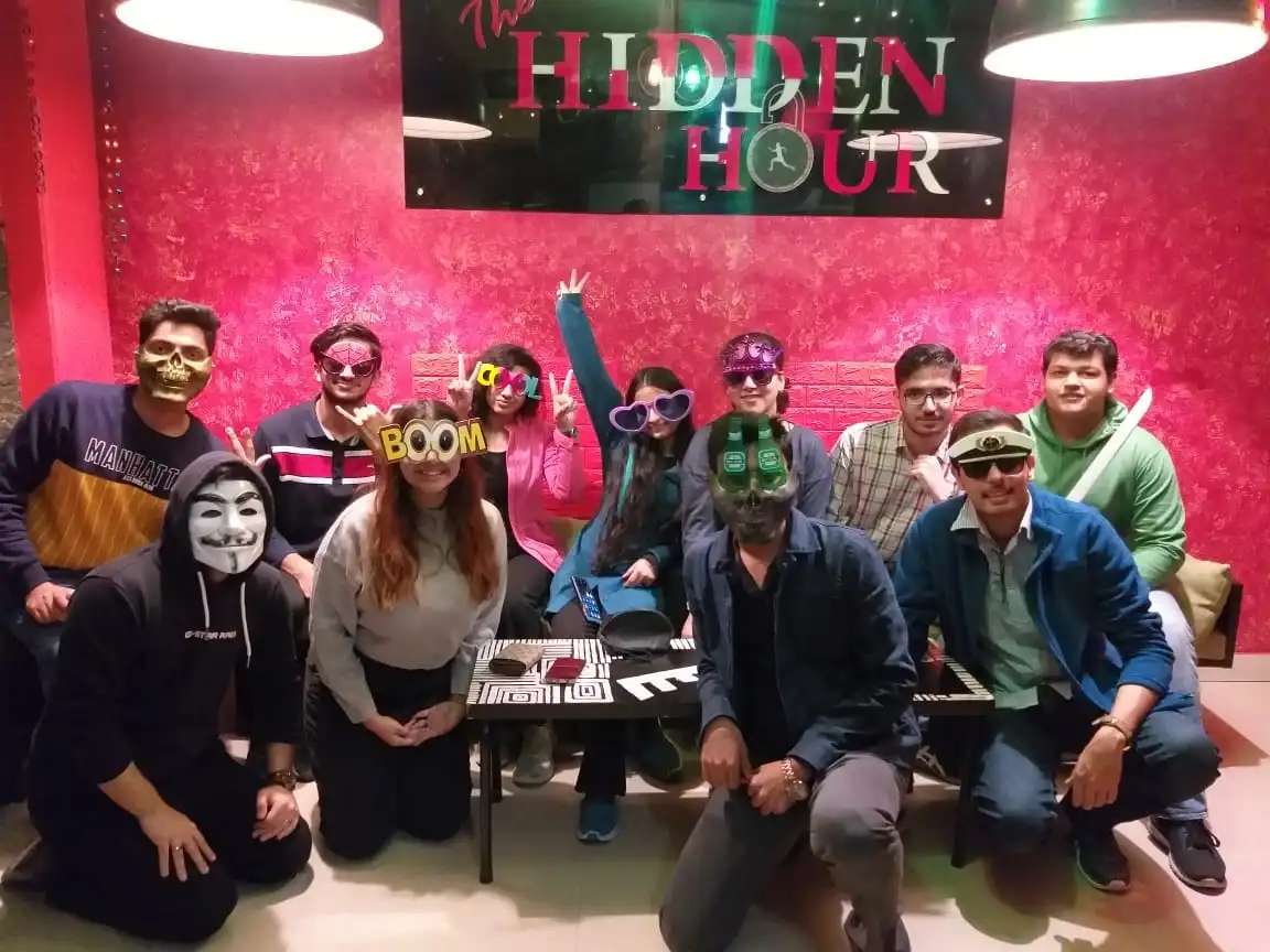 Large corporate group enjoying interactive escape room experience in Hauz Khas Village