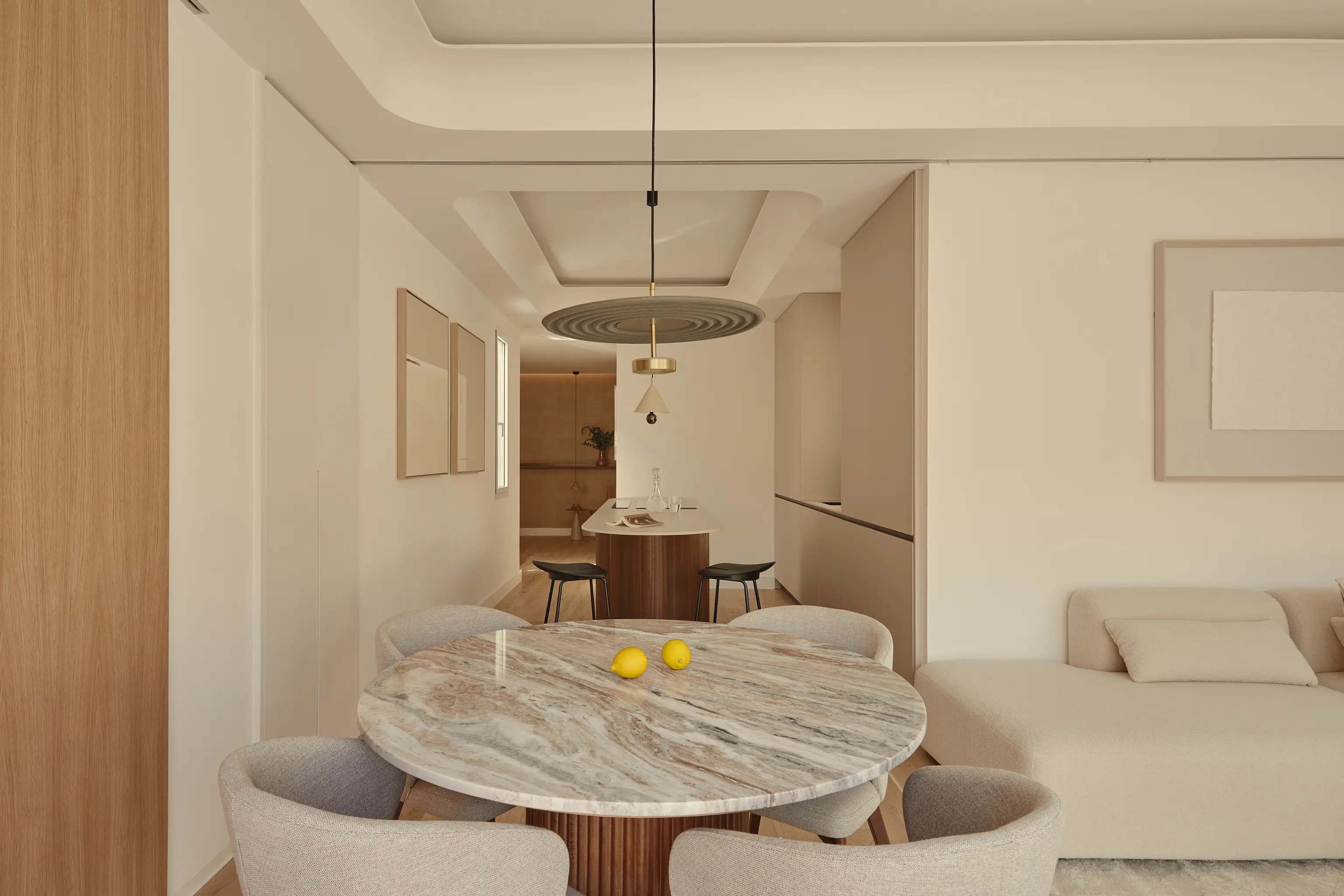 living room with tan leather sectional sofa
