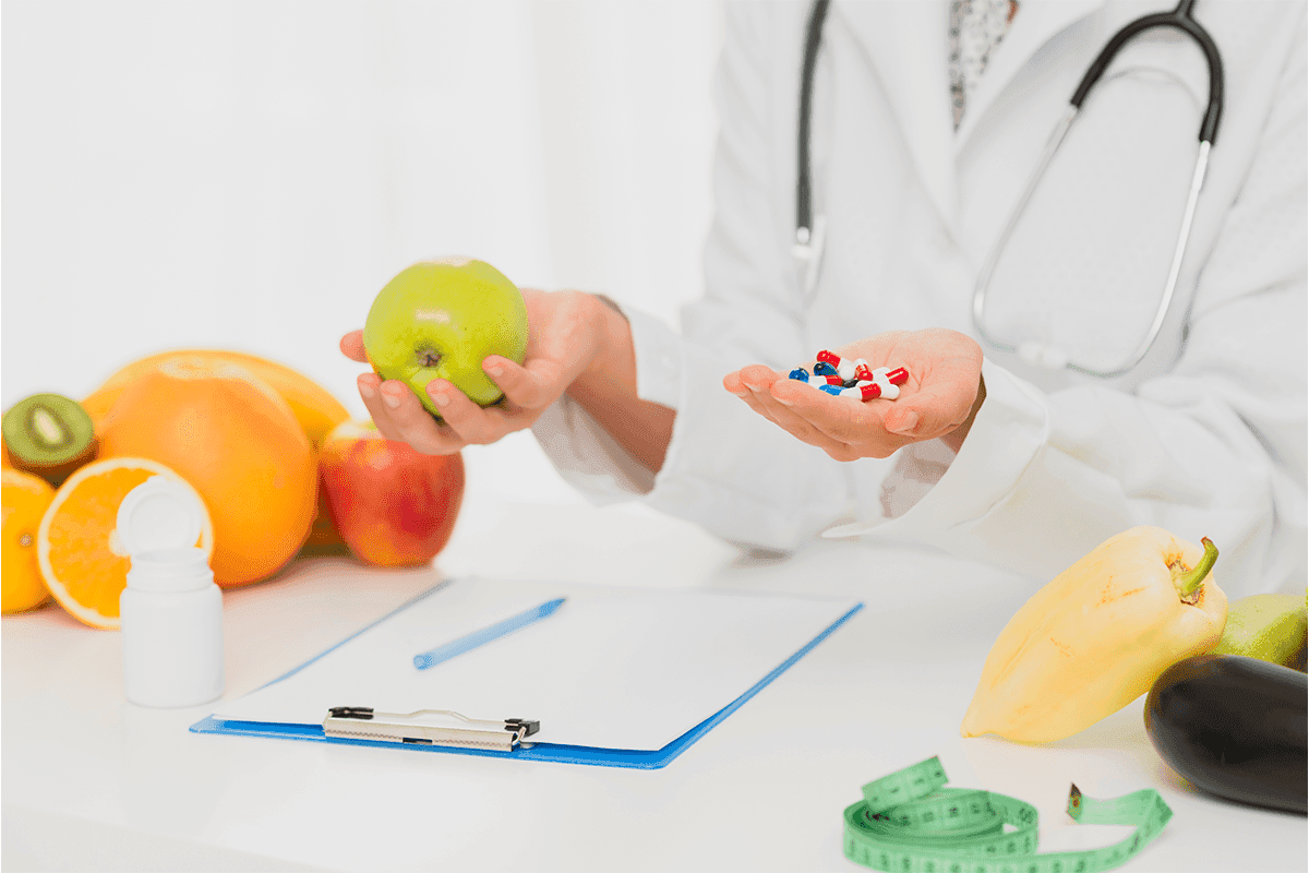 Two surgeons working in a hospital with the hands of a human heart