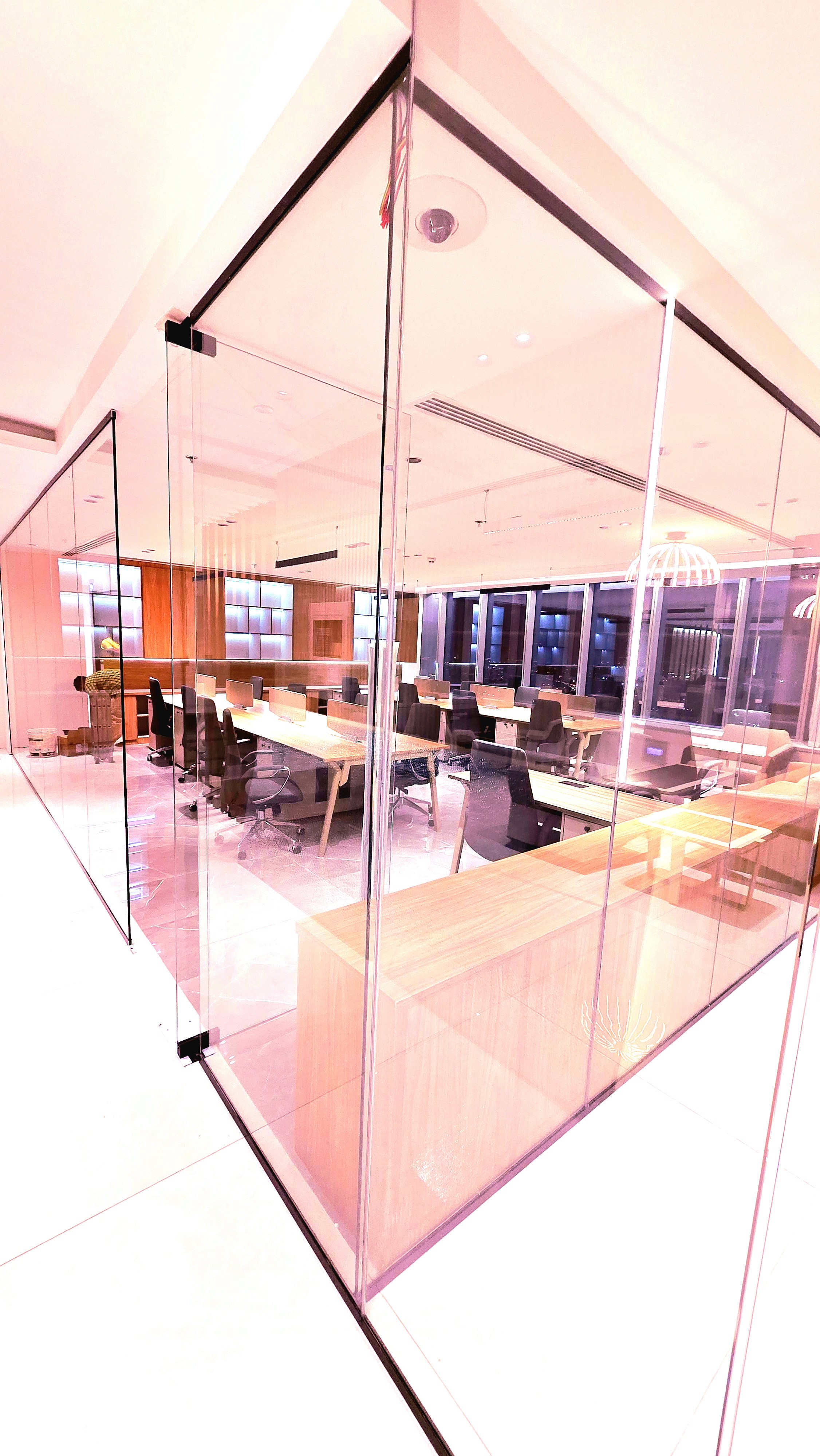 two people looking at a tablet and smiling