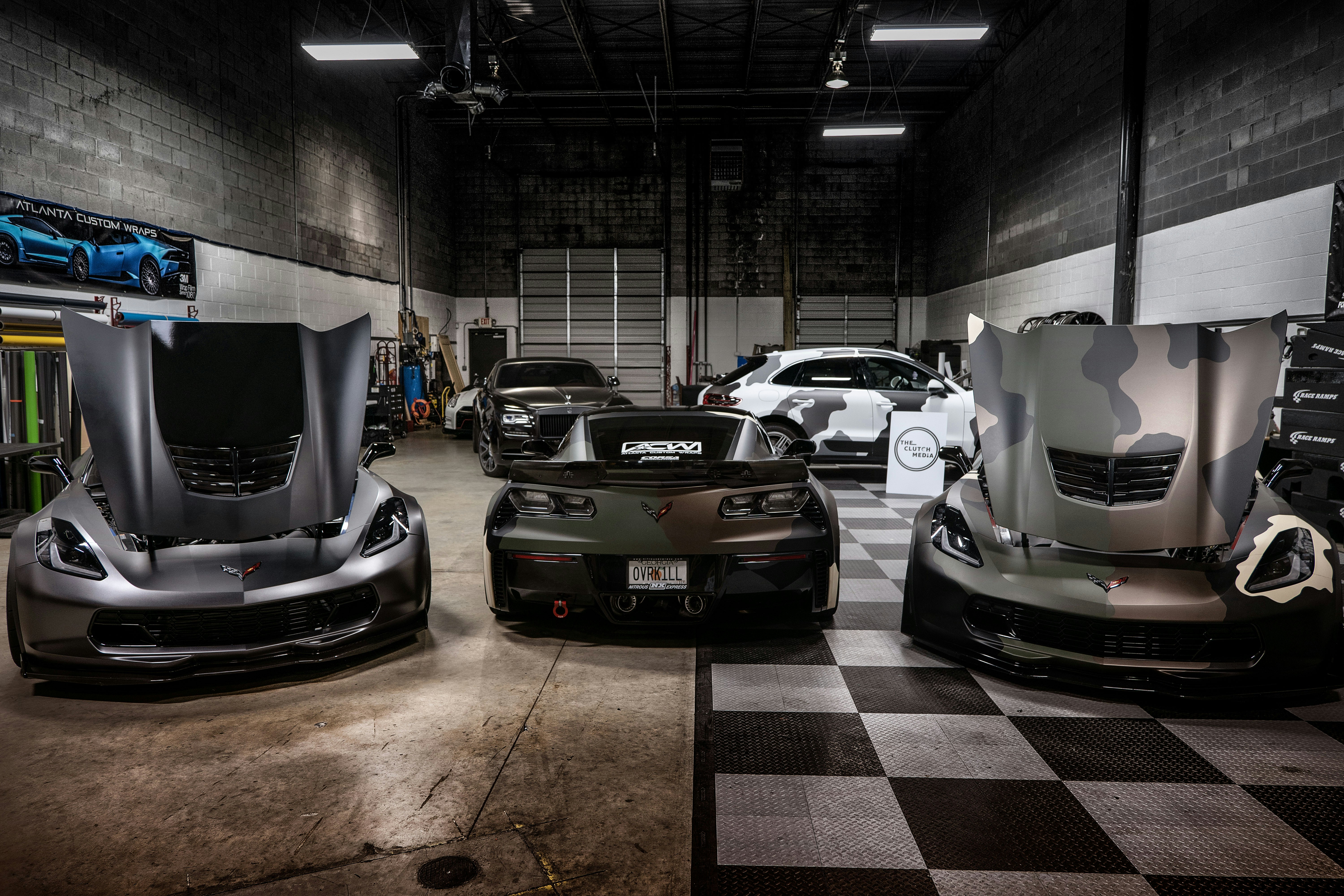 garage with 3 sportcars