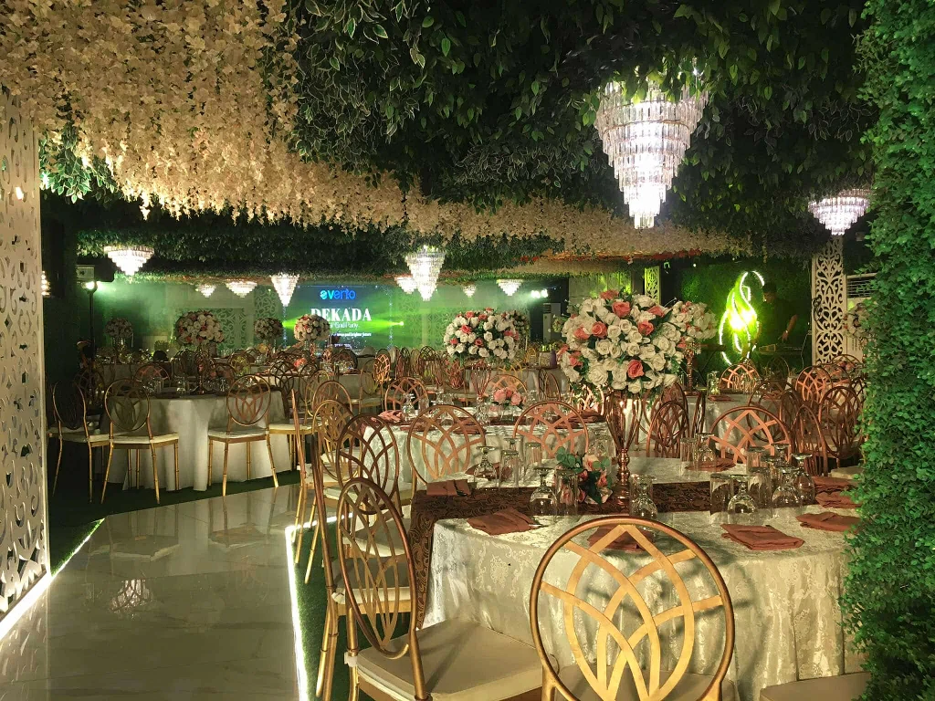 Company gala under the enchanted-forest ceiling of Pandora Hall, Quezon City