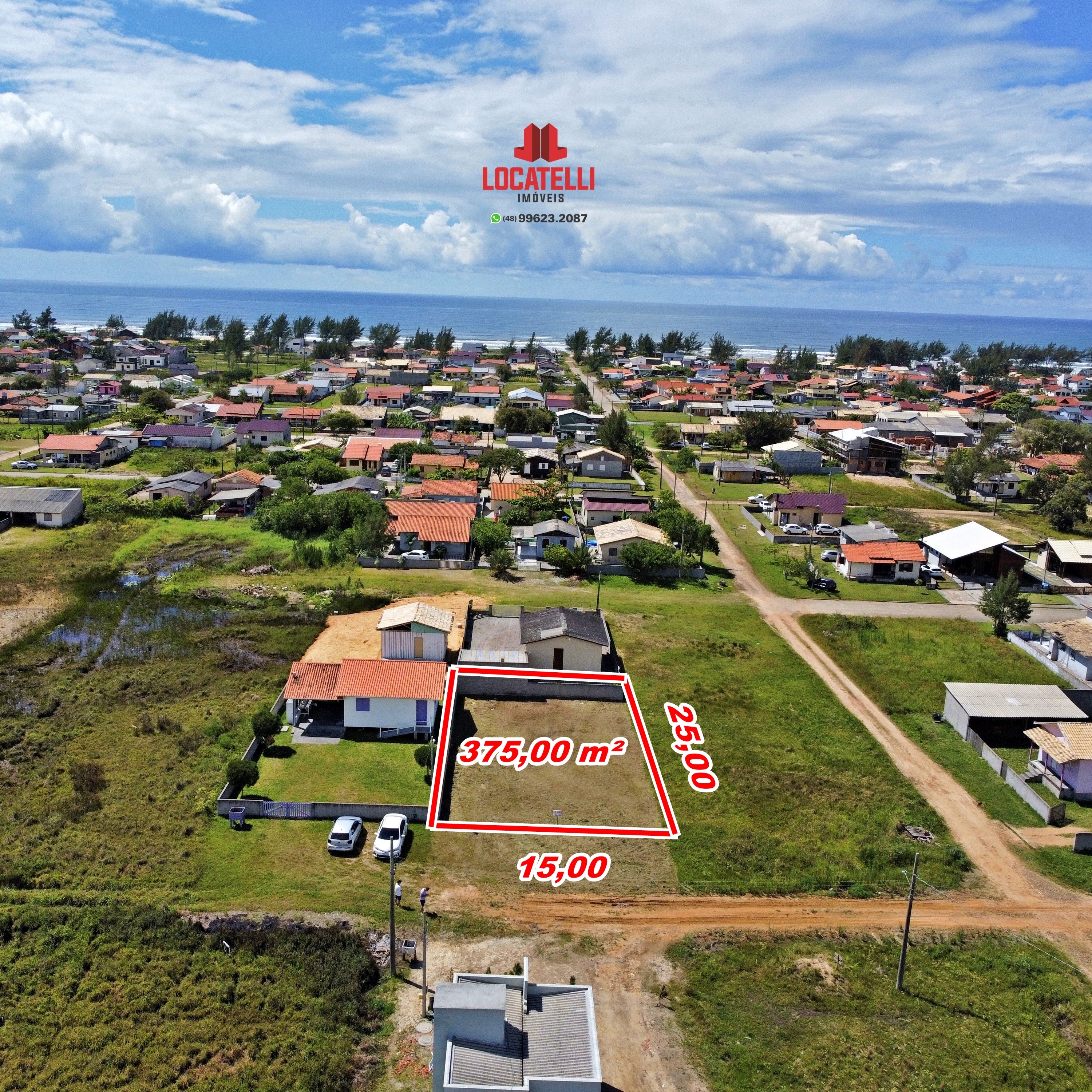 A modern brick house with a two-car garage, well-manicured lawn, and clear blue sky in the background.
