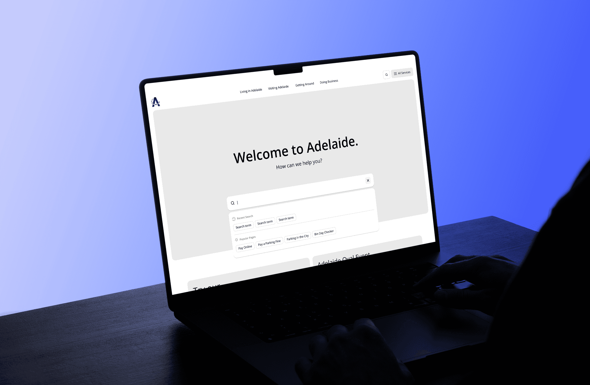 Wireframes displayed in a laptop mock-up.