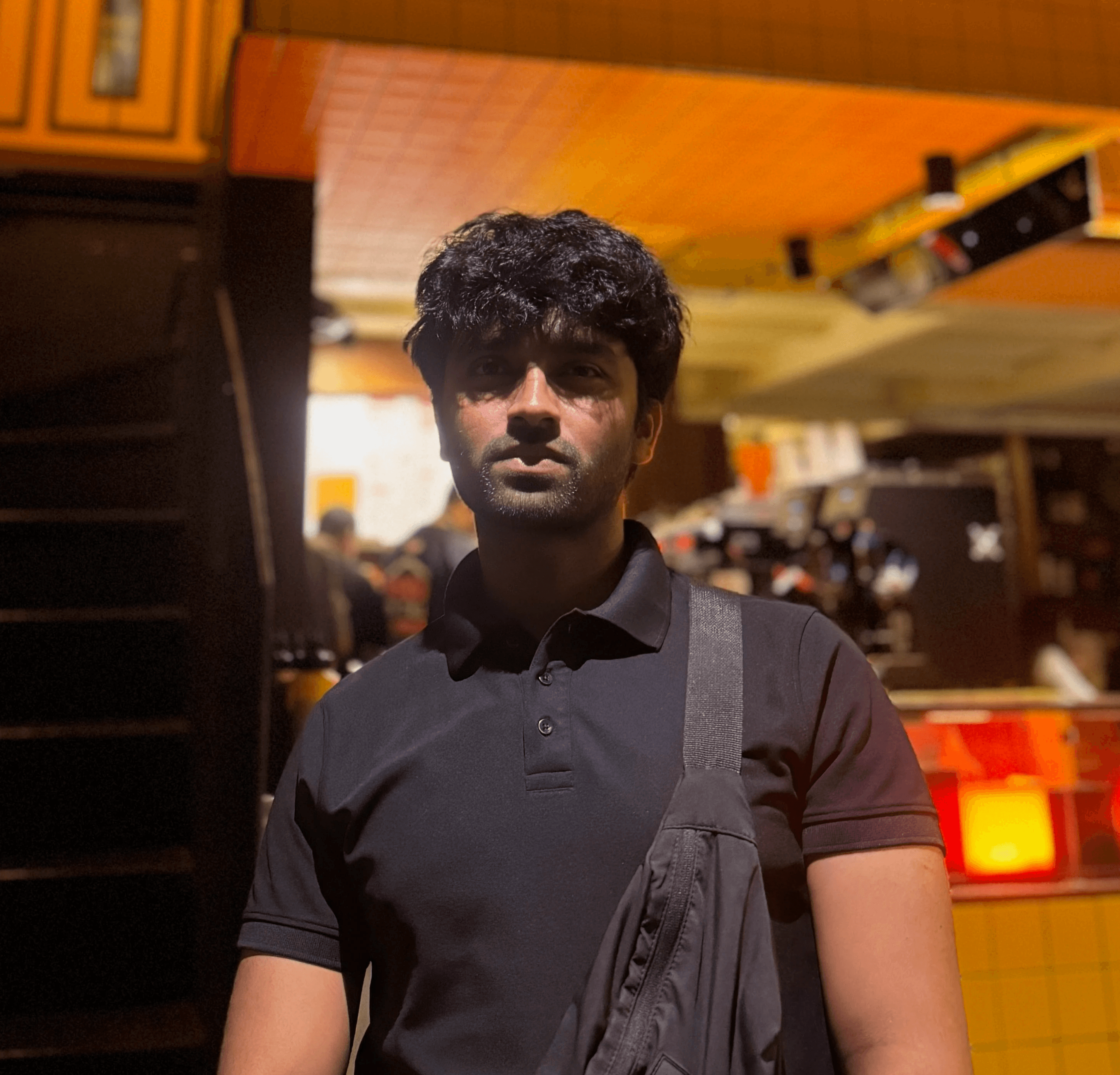 clear drinking glass with coffee on top of white table