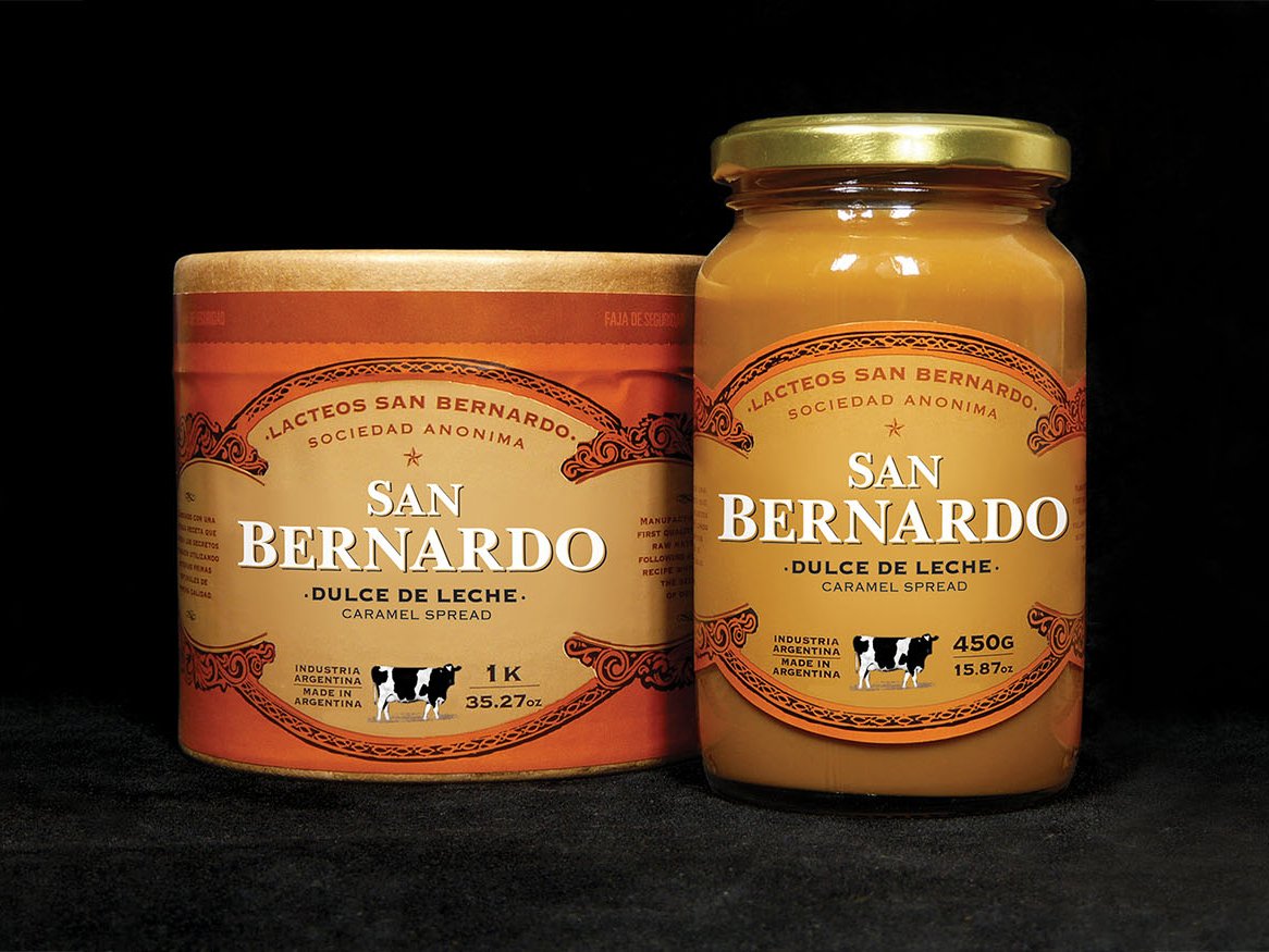 Rooftops of a coastal town with the sea in background