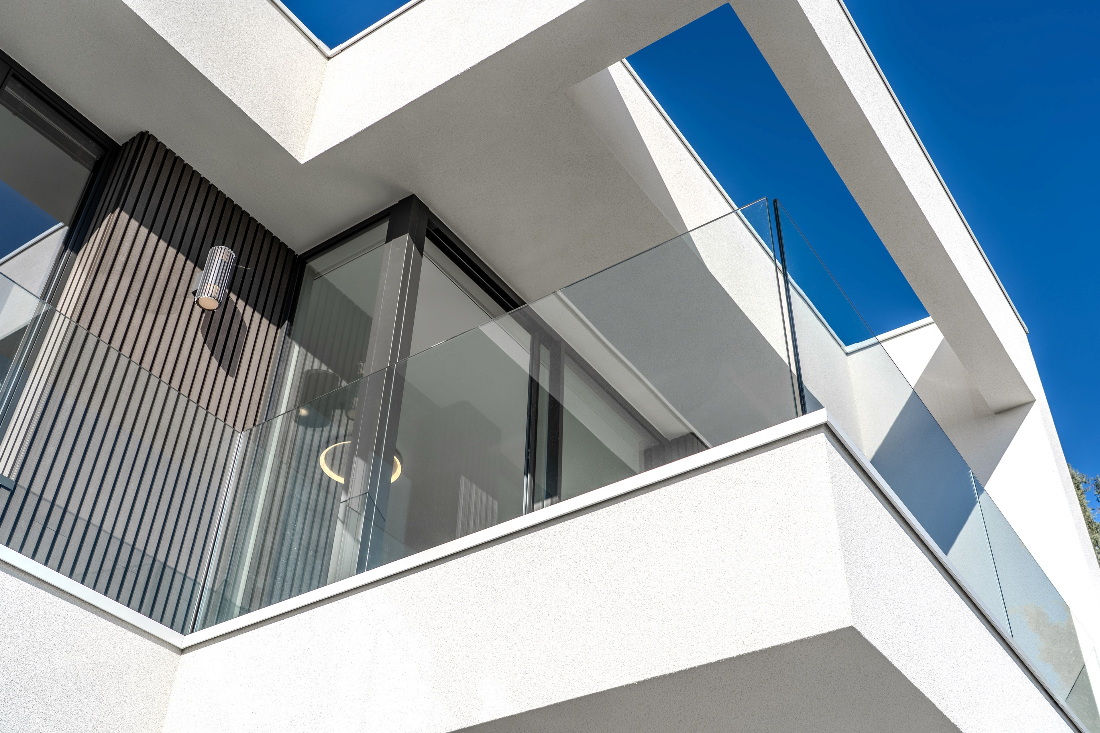 A woman in a colorful attire with a colorful background