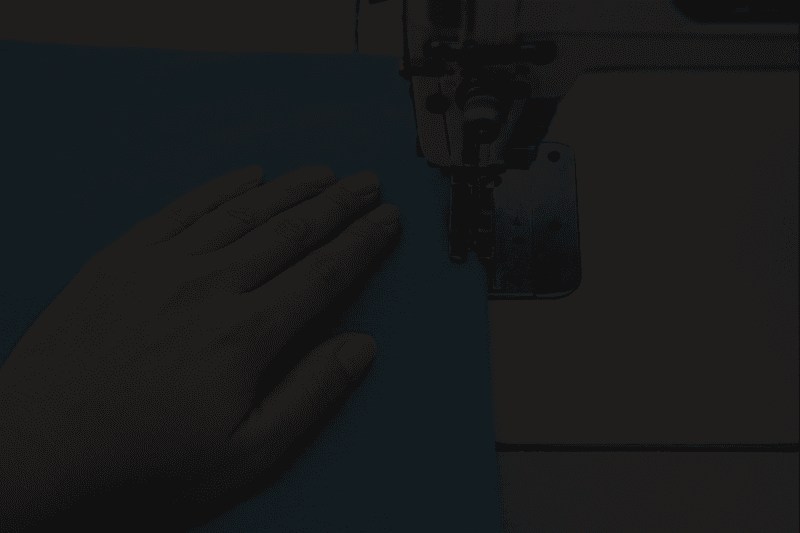 employee who works on the knitting machine.