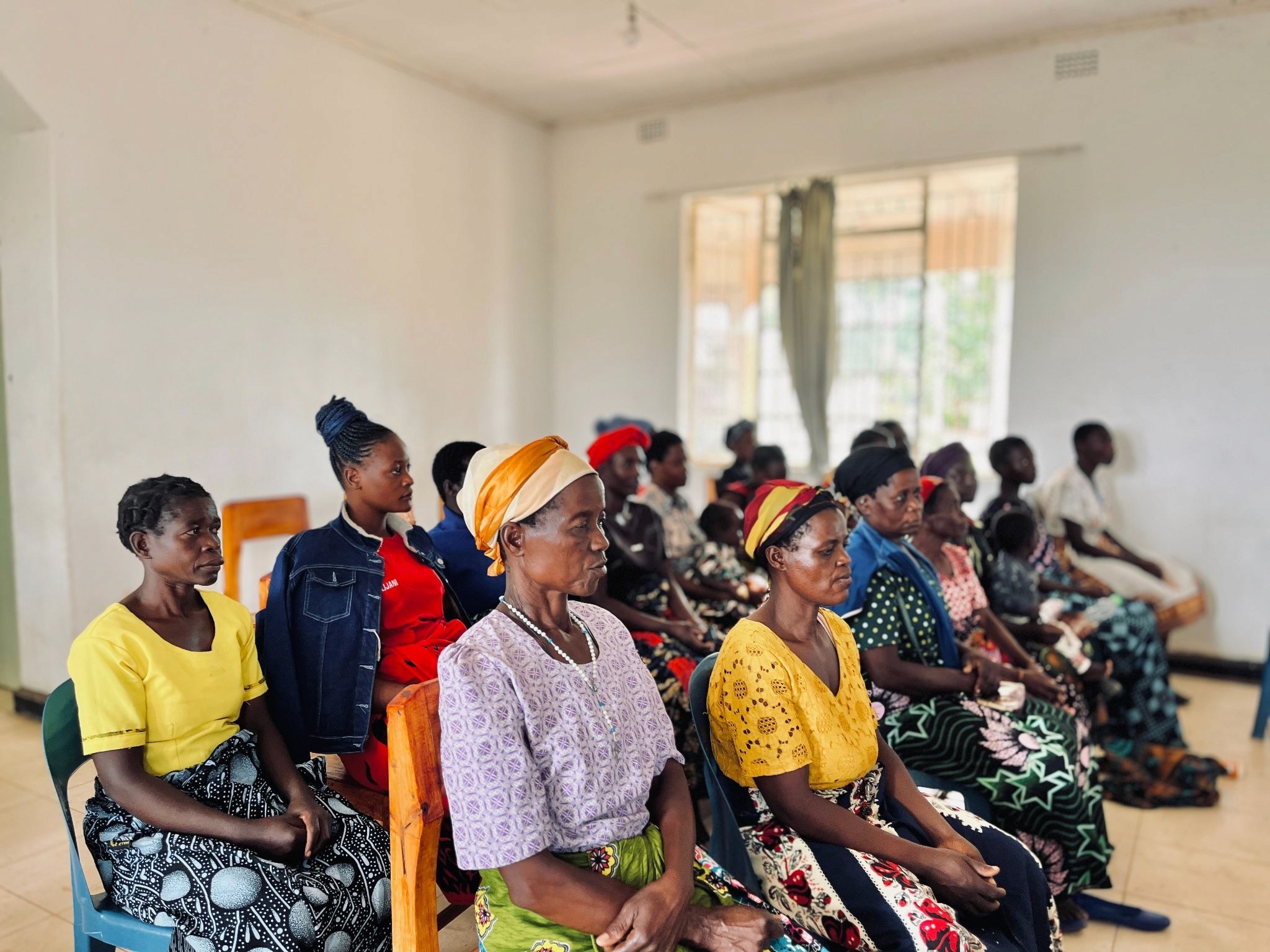 Rural Malawian women attending a Bitcoin education event hosted by the Women of Satoshi Cooperative in Malawi