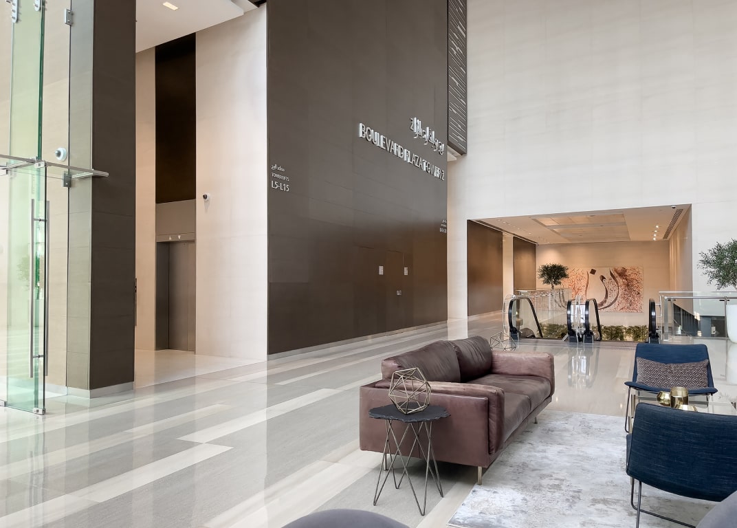 Boulevard Plaza Tower 1 features a spacious, welcoming lobby, offering a professional setting for myOffice business center.