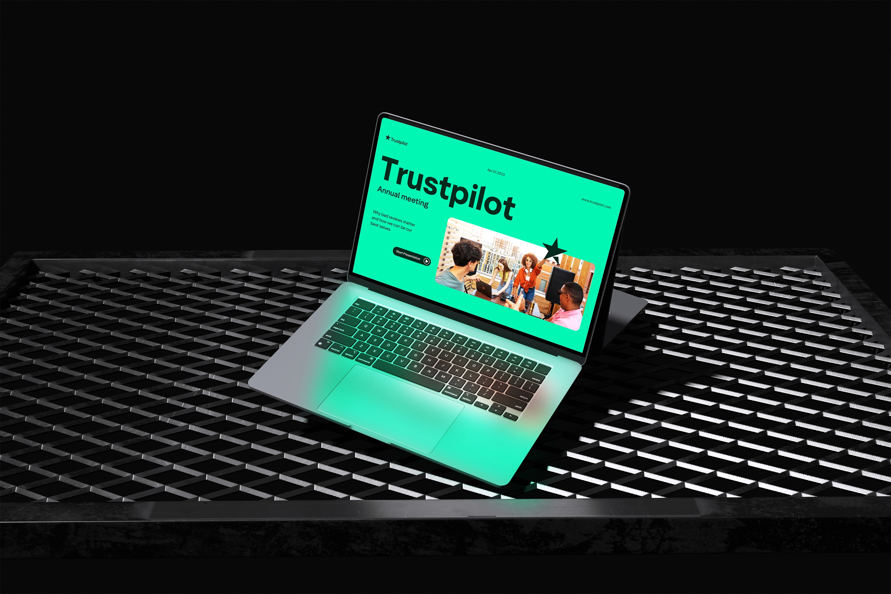 Laptop mockup of a Trustpilot presentation for an annual meeting.