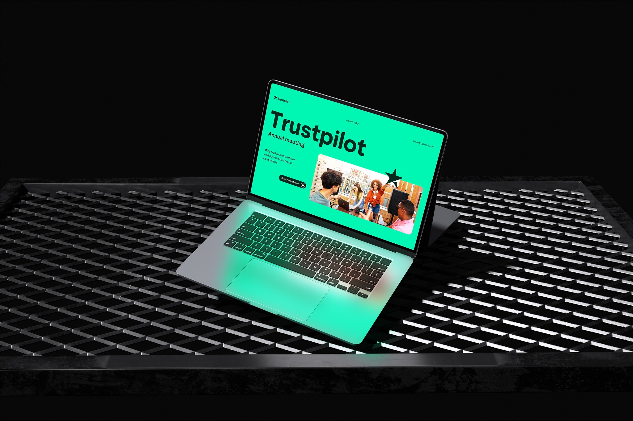 Laptop mockup of a Trustpilot presentation for an annual meeting.