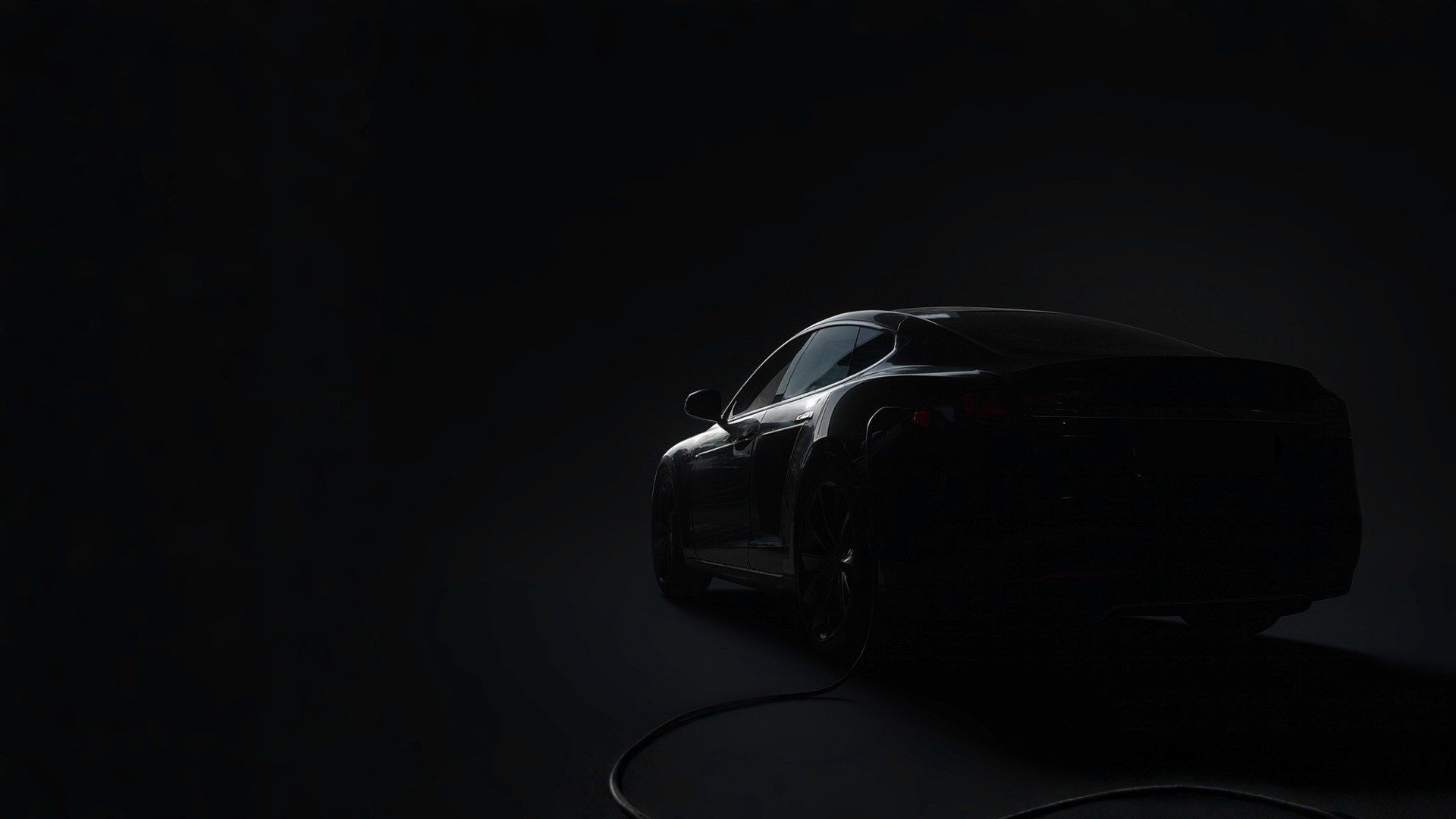 Tesla Model S on dark background