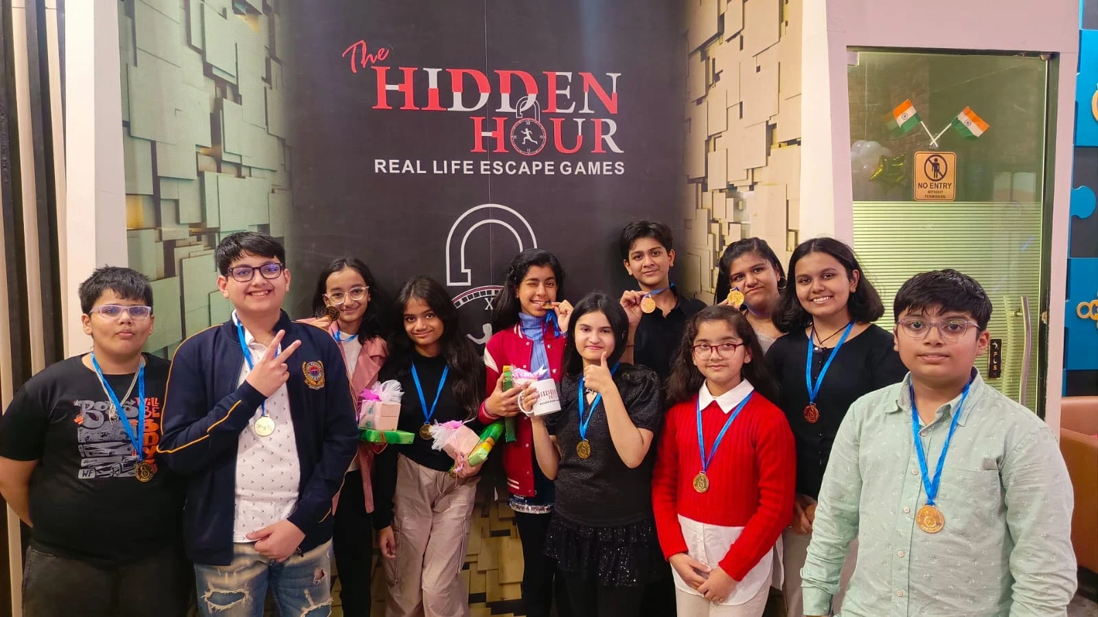 Guests playing interactive puzzles during a birthday celebration at Hidden Hour Delhi