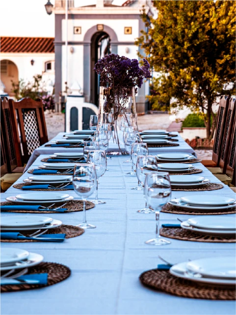 a picnic table in front of a white building