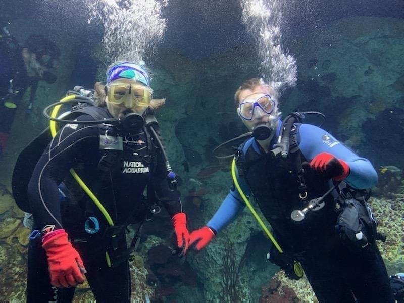Scuba diving in an aquarium with my aunt