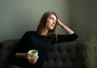 Thumbnail of a woman deep in thought