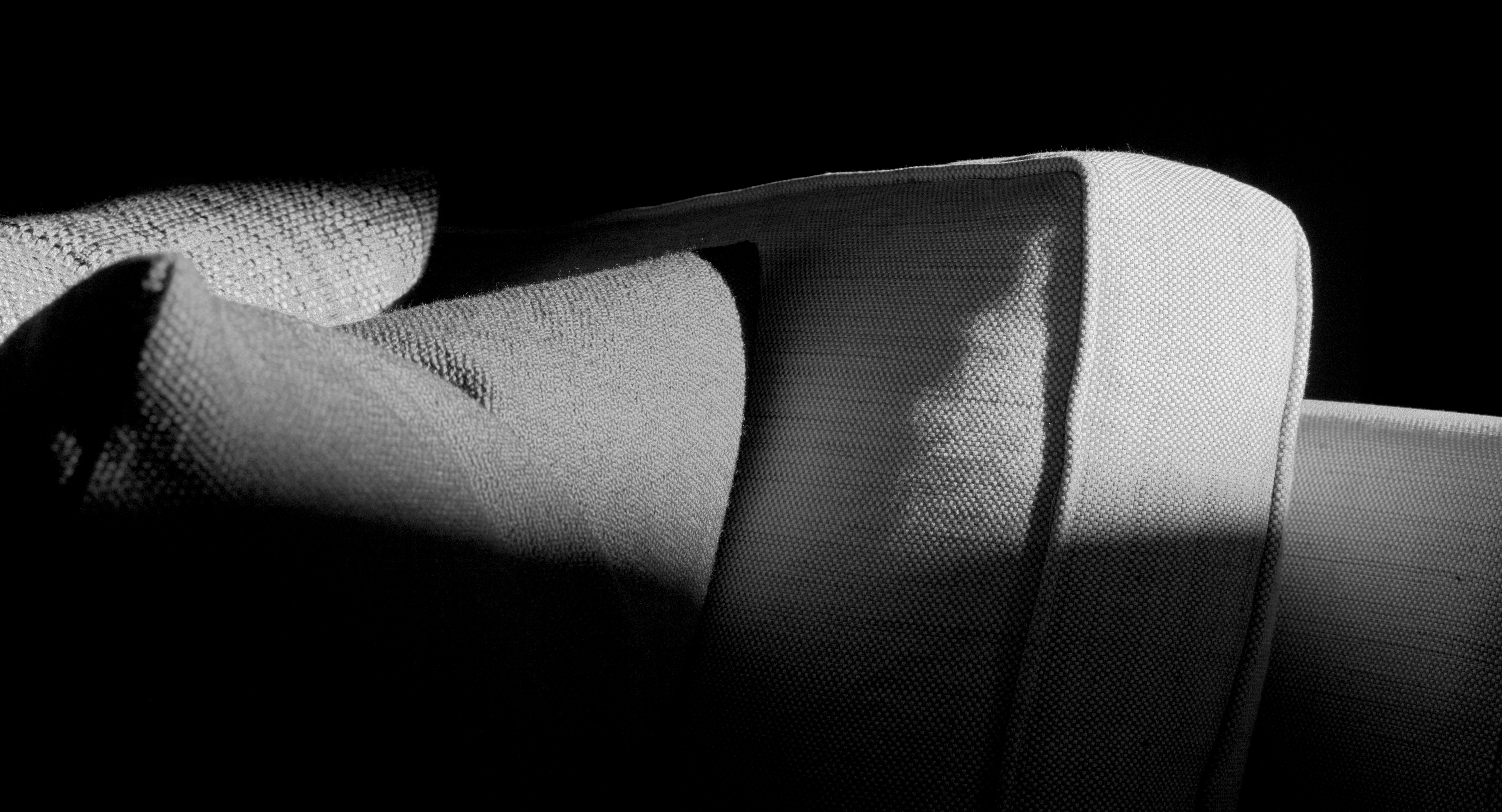 a black and white photo of a couch