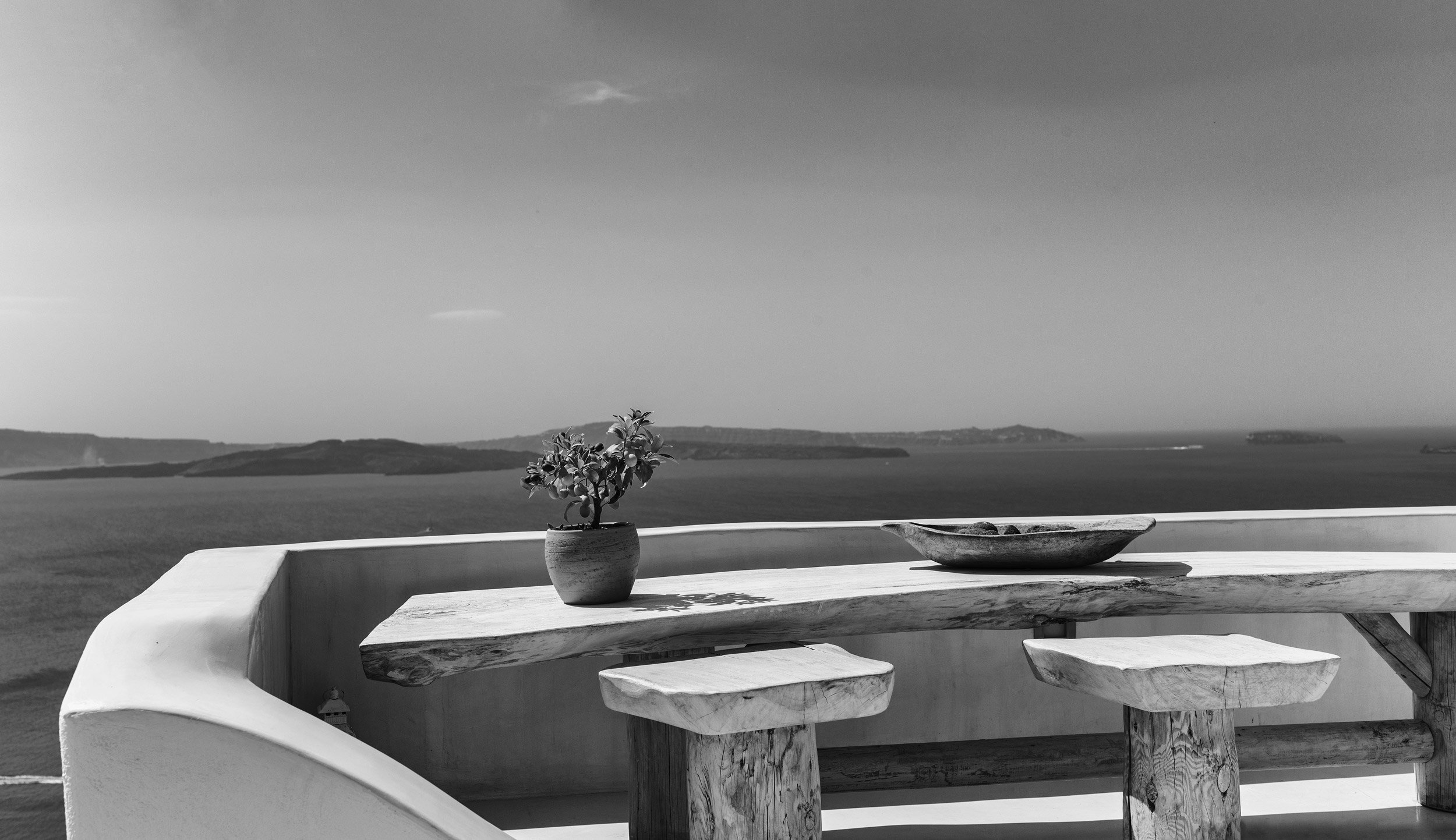 Private jet charter to Santorini Greece - Volcanic island caldera and Oia sunset views