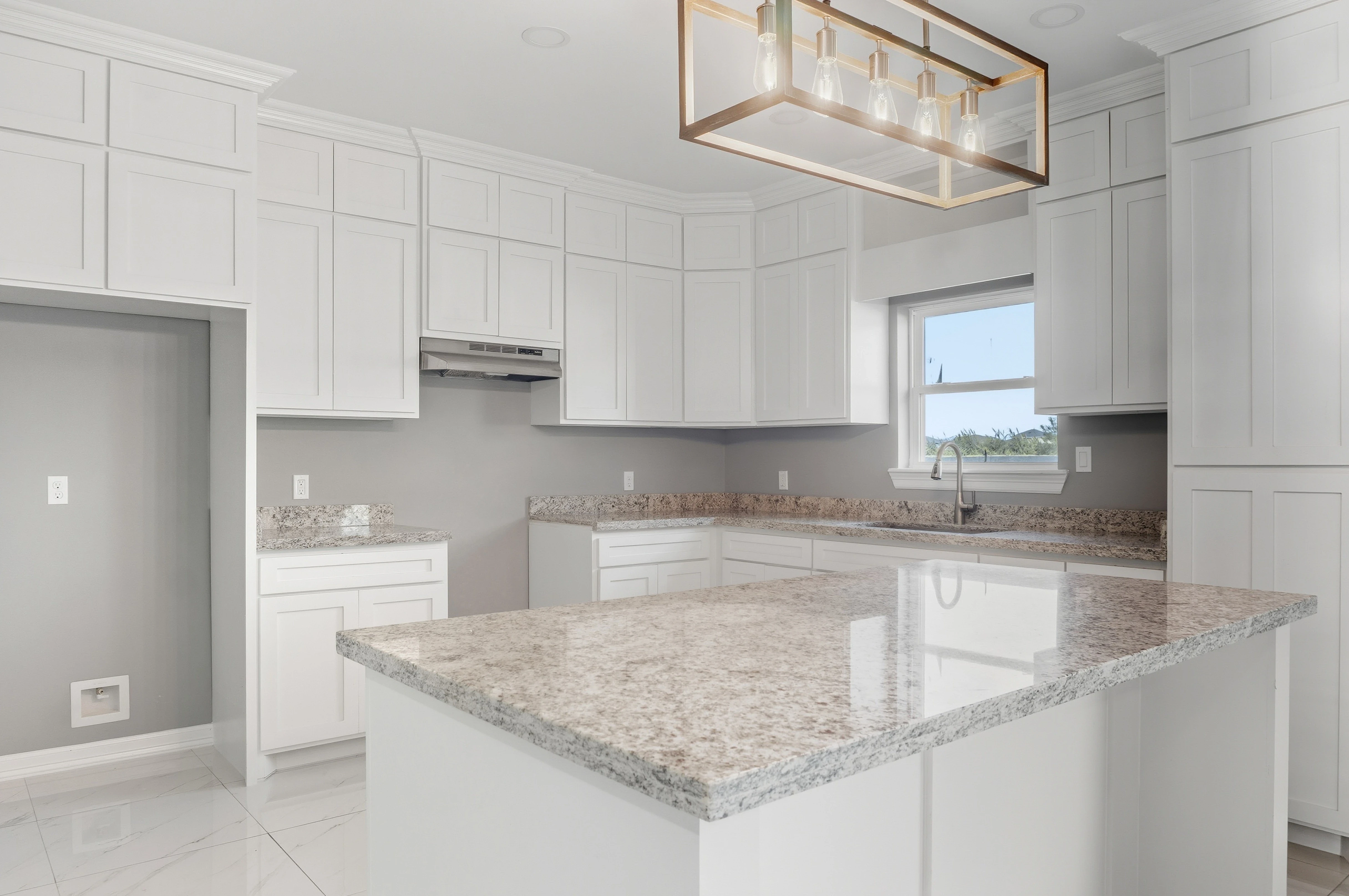 A picture of a house during twilight.